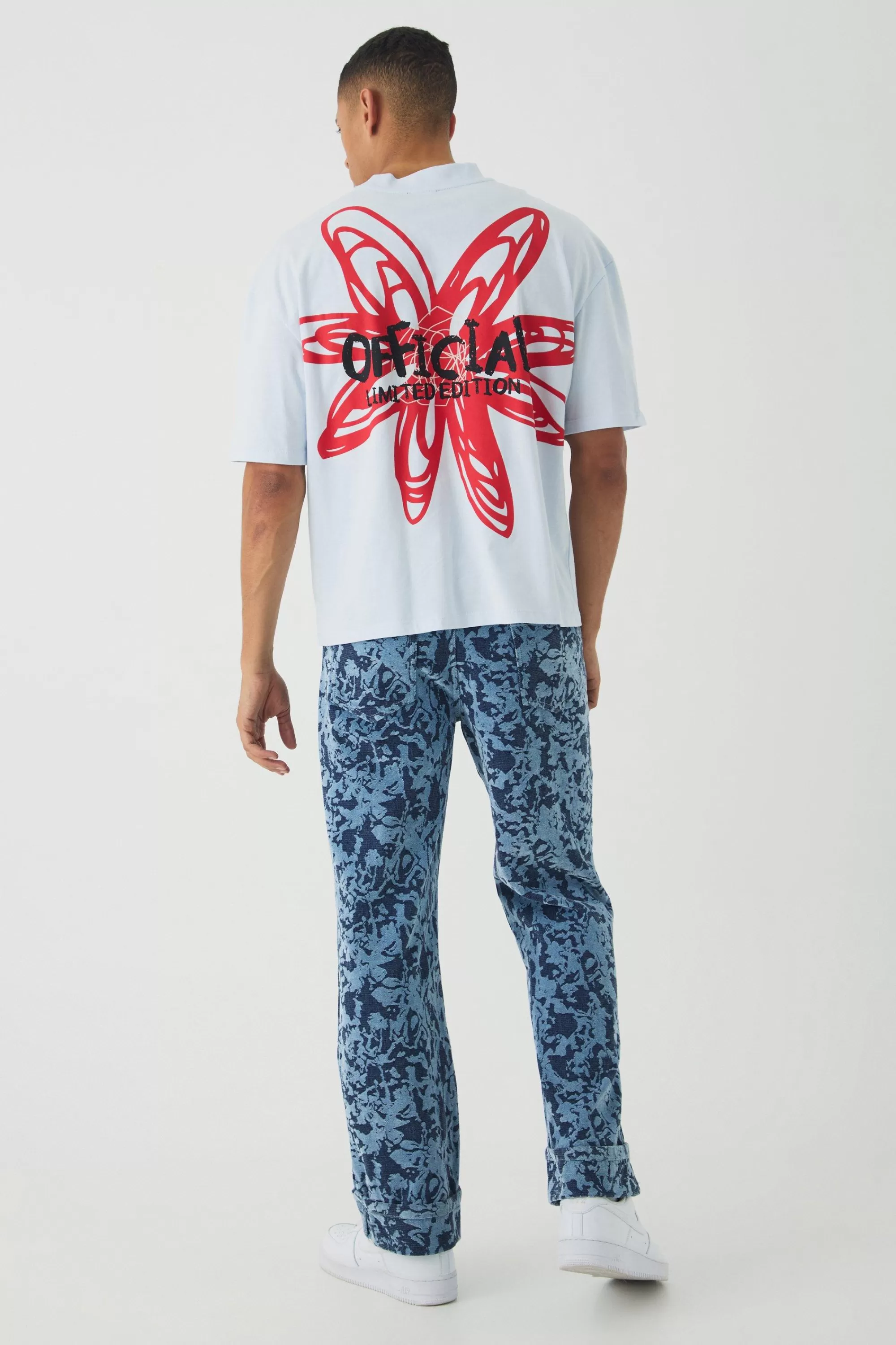 boohooMAN Relaxed Fit Abstract Flock Turn Up Hem Jeans | UK