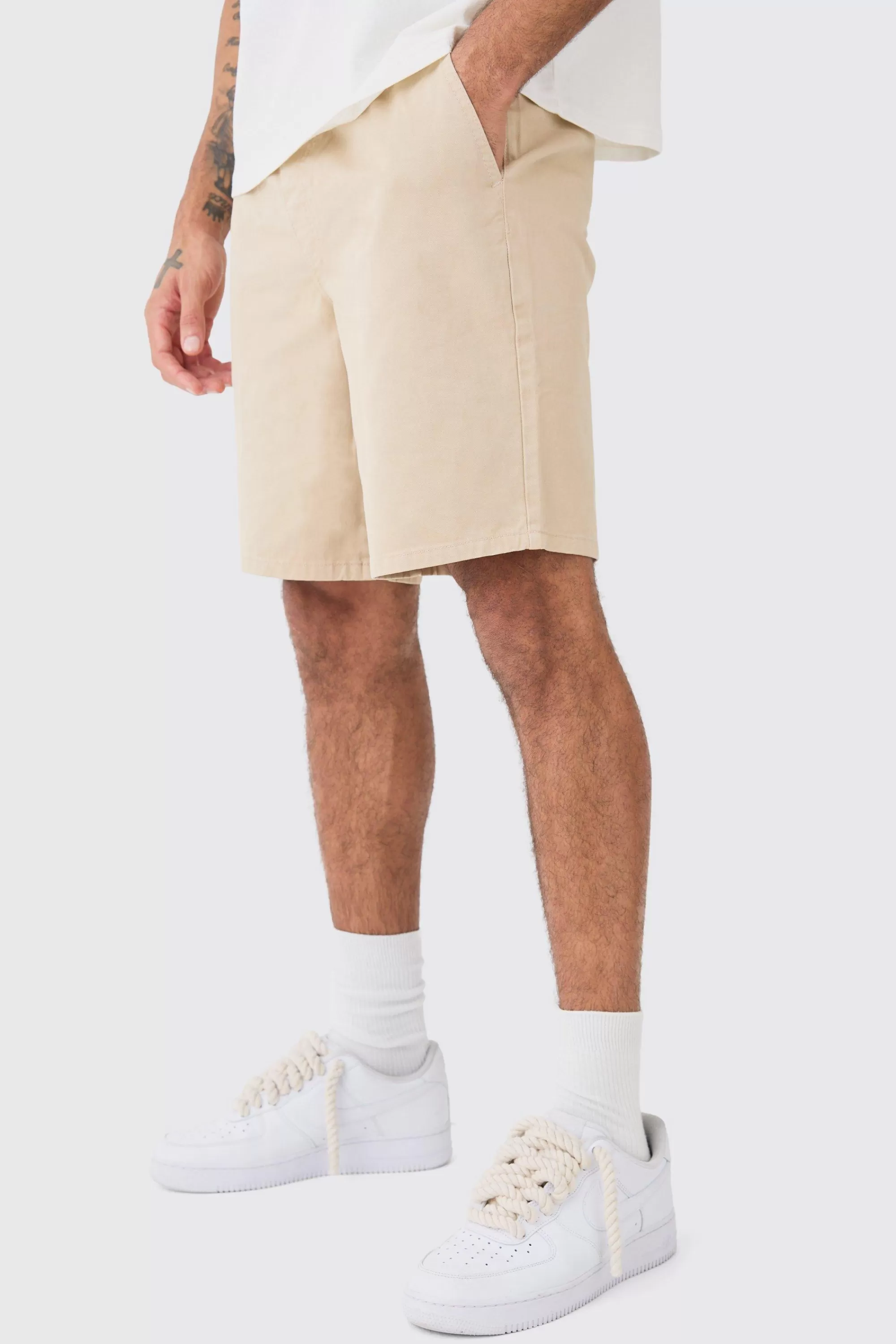 boohooMAN Relaxed Fit Elasticated Waist Chino Shorts In | UK