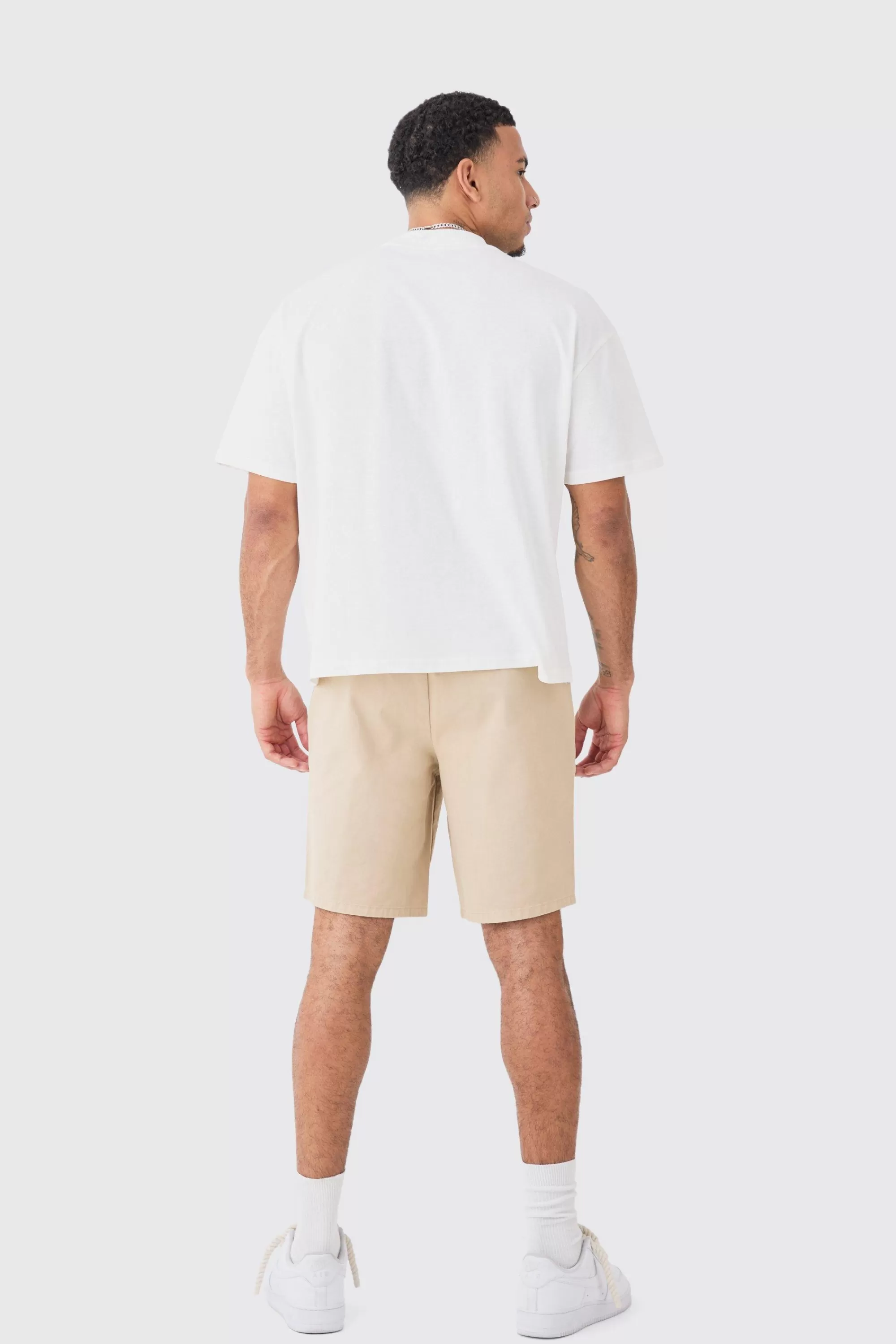 boohooMAN Relaxed Fit Elasticated Waist Chino Shorts In | UK
