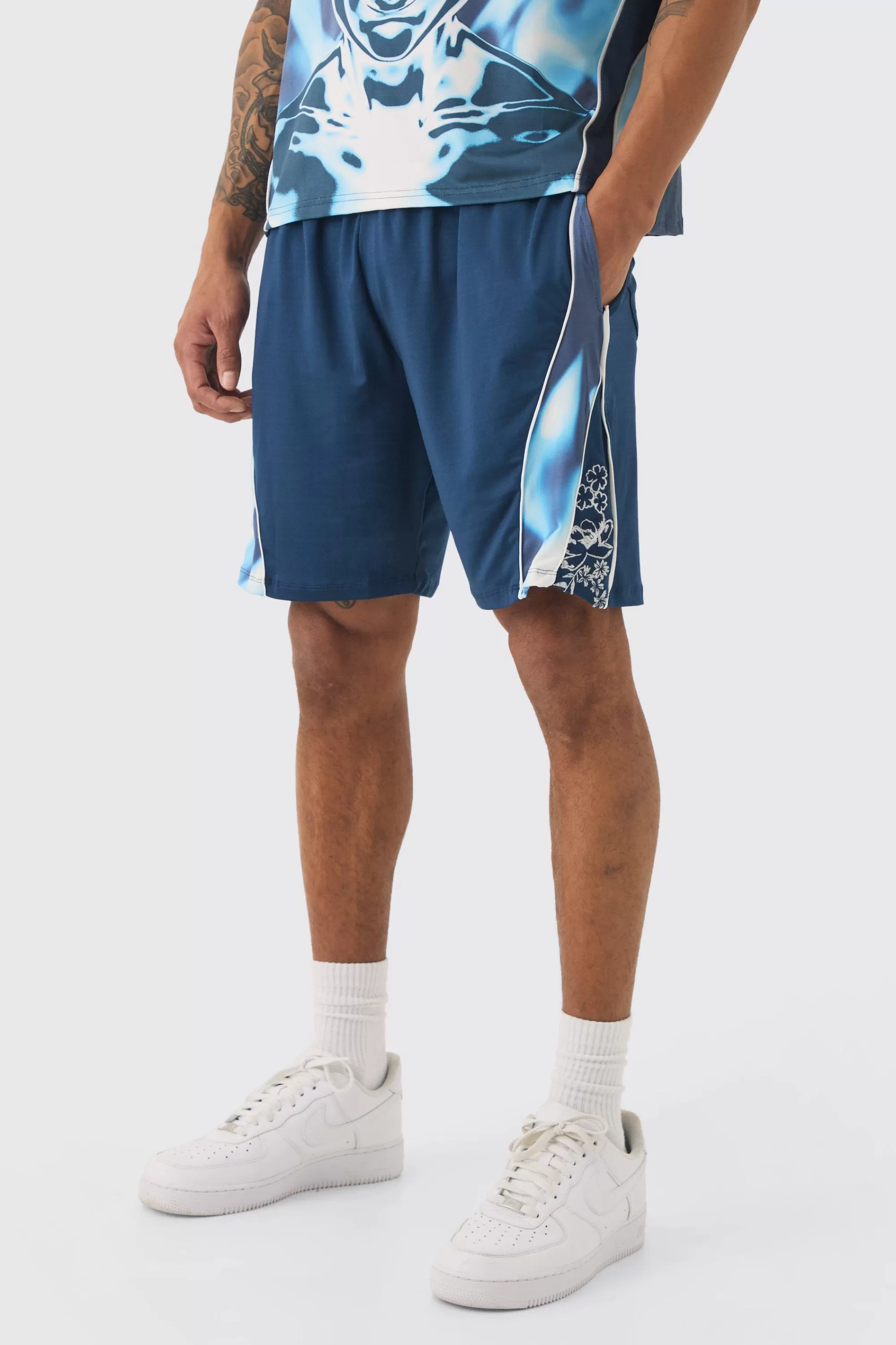 boohooMAN Relaxed FIt Floral Printed Football Short | UK