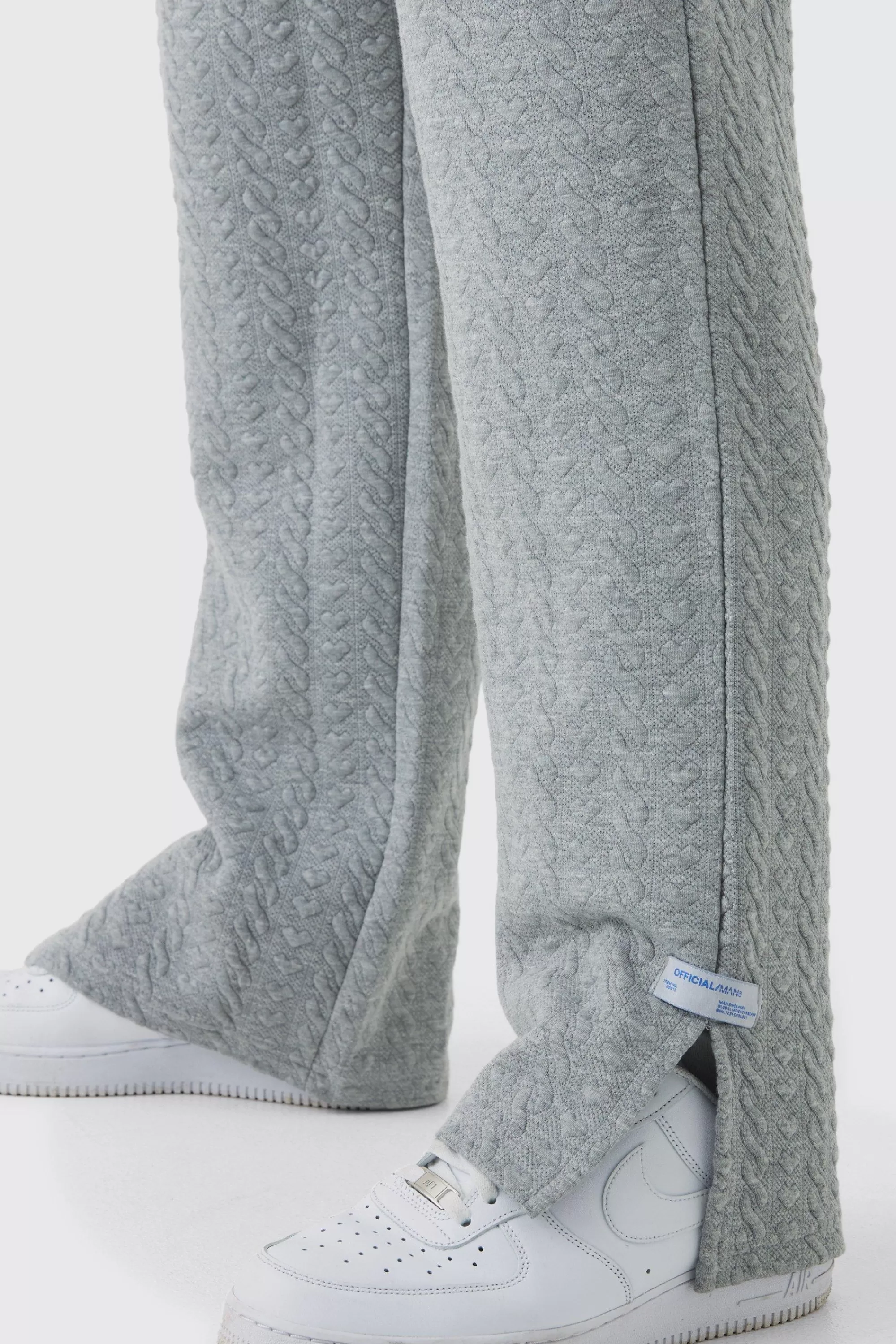 boohooMAN Relaxed Fit Herringbone Split Hem Woven Tab Jogger | UK