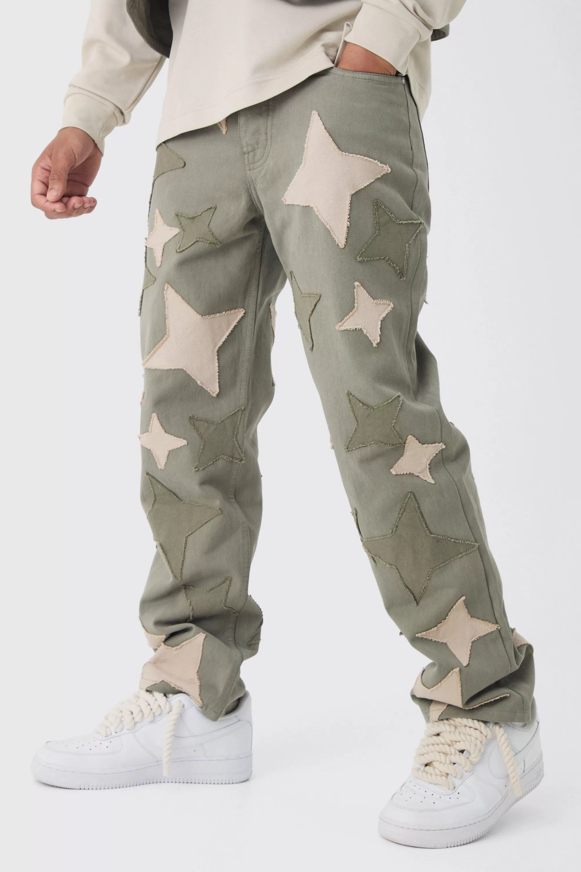 boohooMAN Relaxed Fit Star Patchwork Applique Jeans | UK