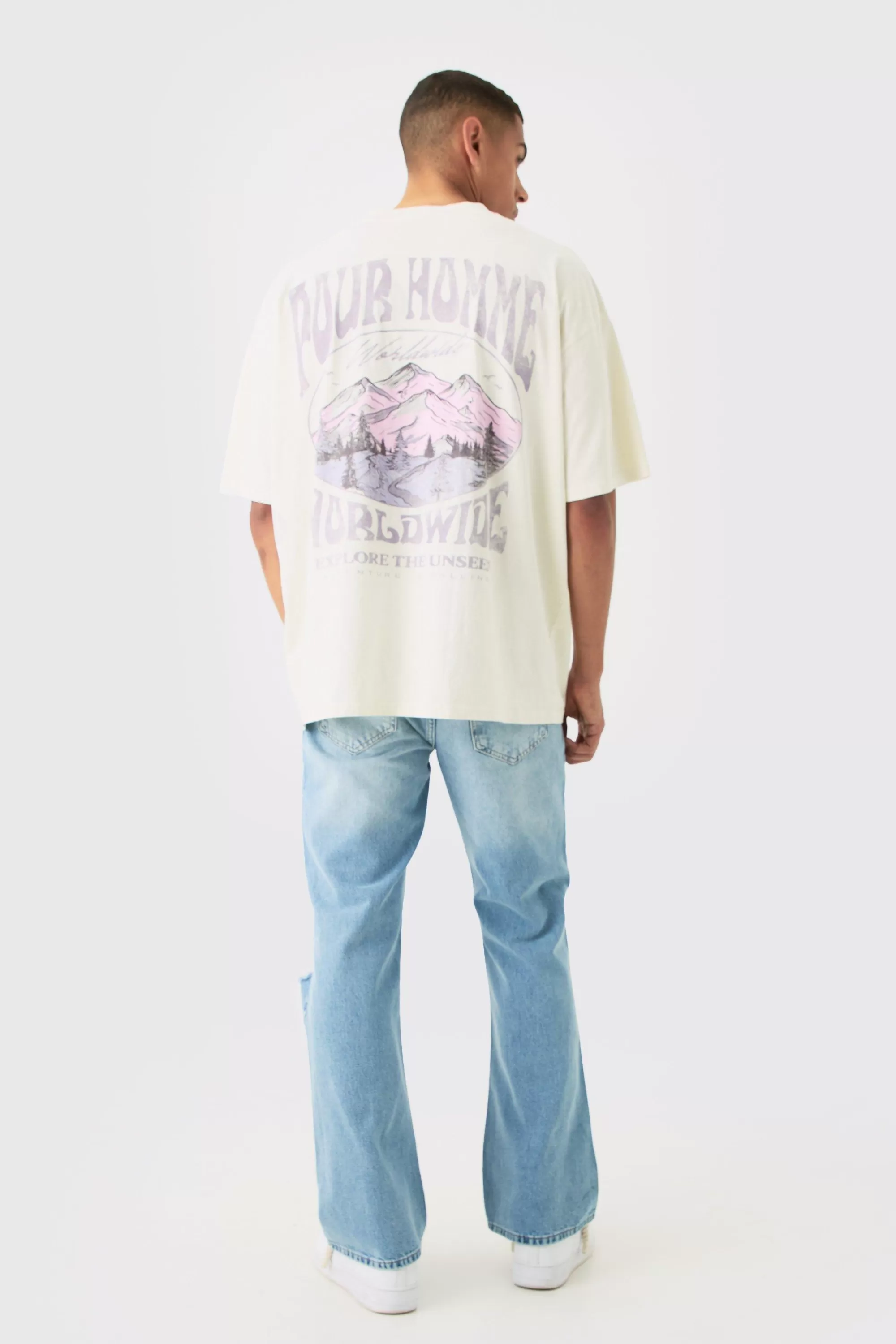 boohooMAN Relaxed Flare Rigid Knee Rip Snow Wash Denim Jean | UK