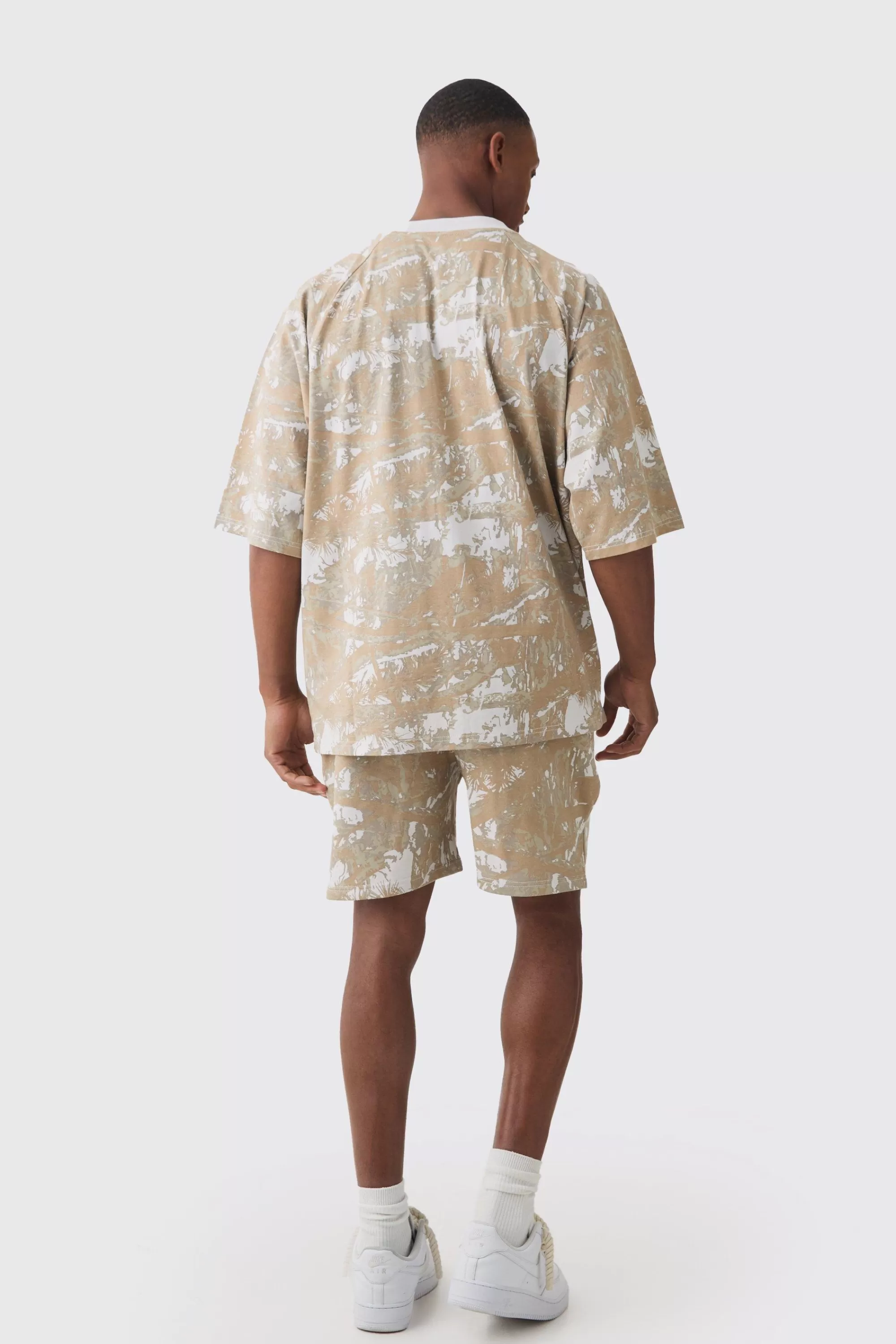 boohooMAN Relaxed Forest Camo Printed Shorts | UK