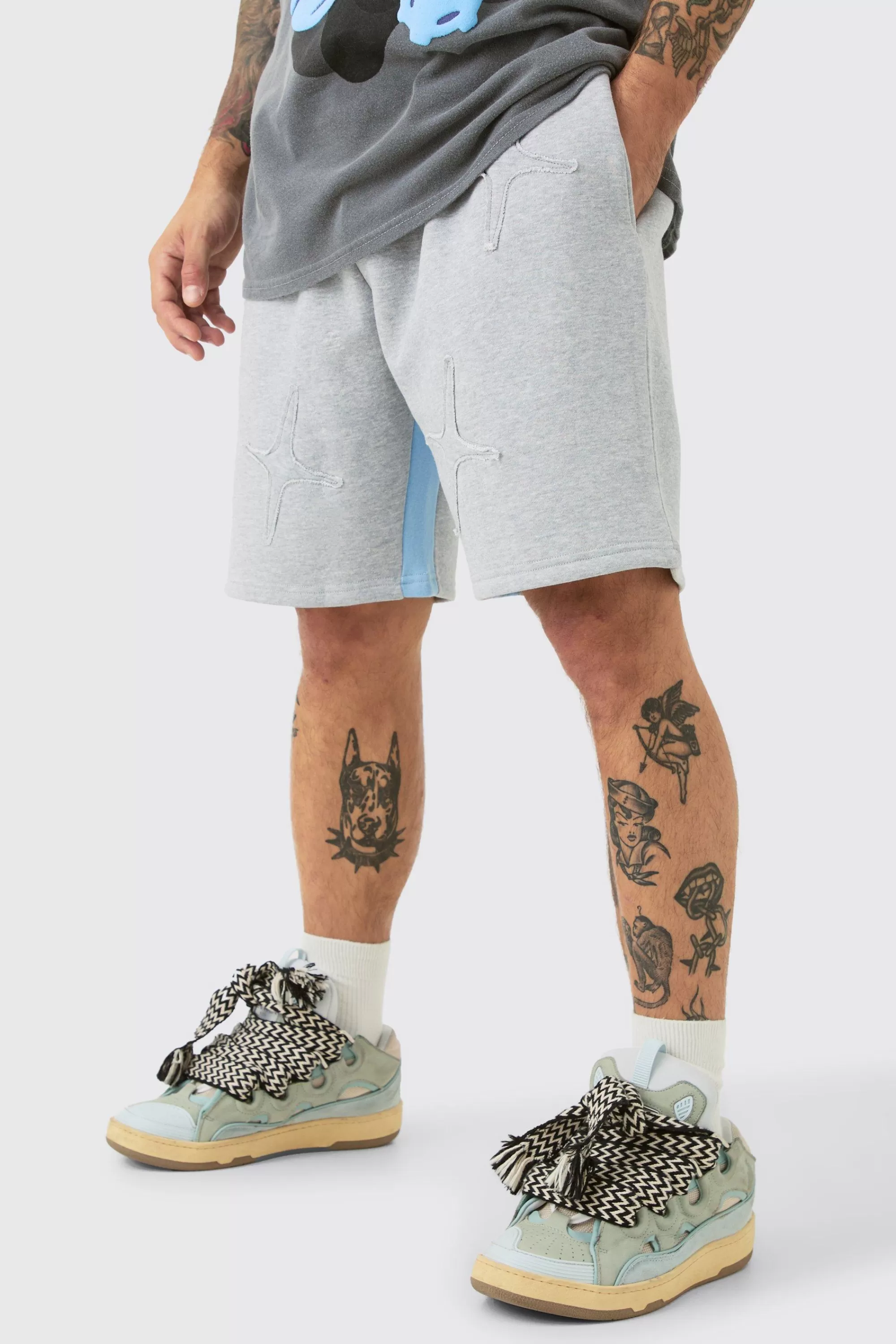 boohooMAN Relaxed Raw Applique Shorts | UK