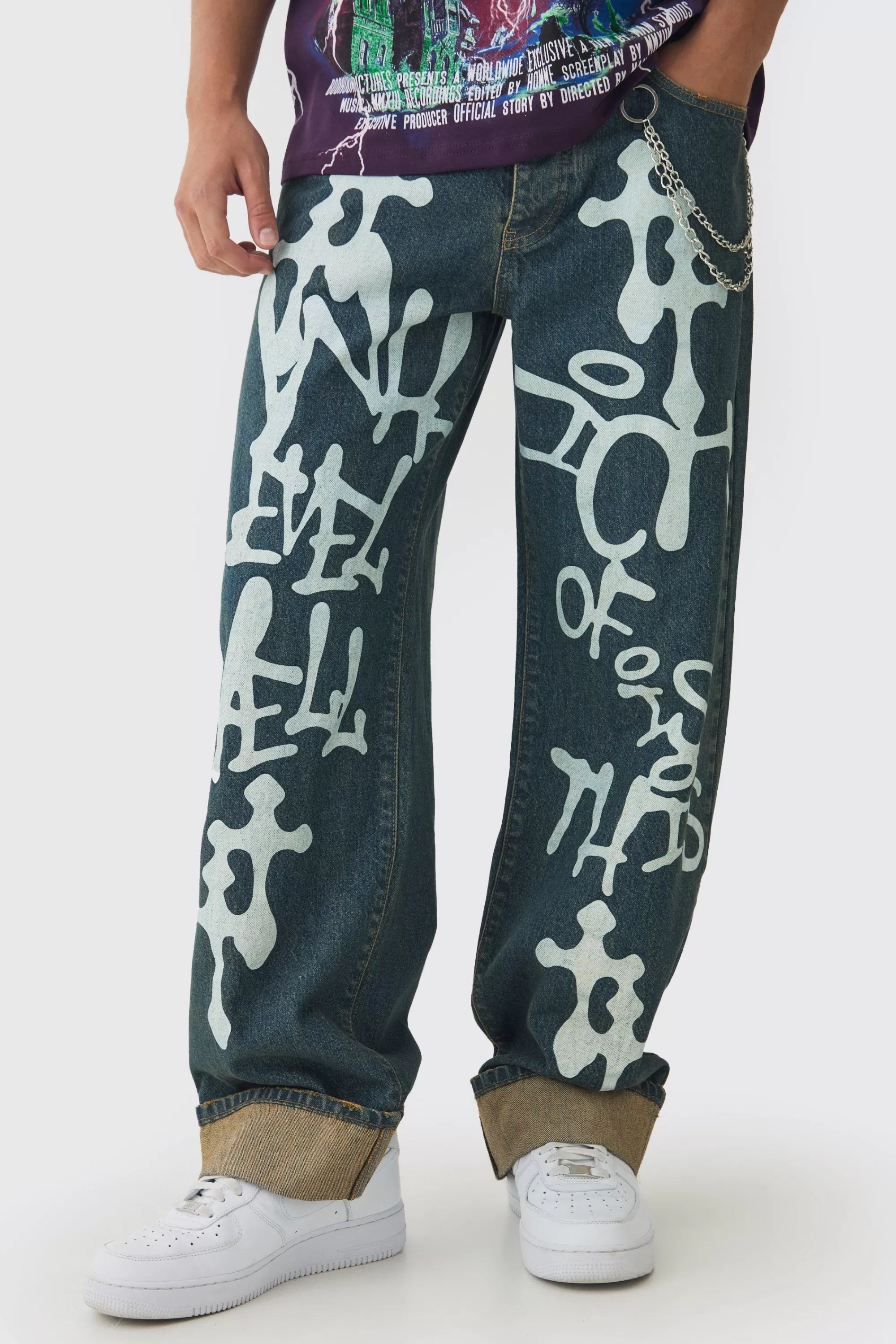 boohooMAN Relaxed Rigid Graffiti Spray Printed Jeans | UK