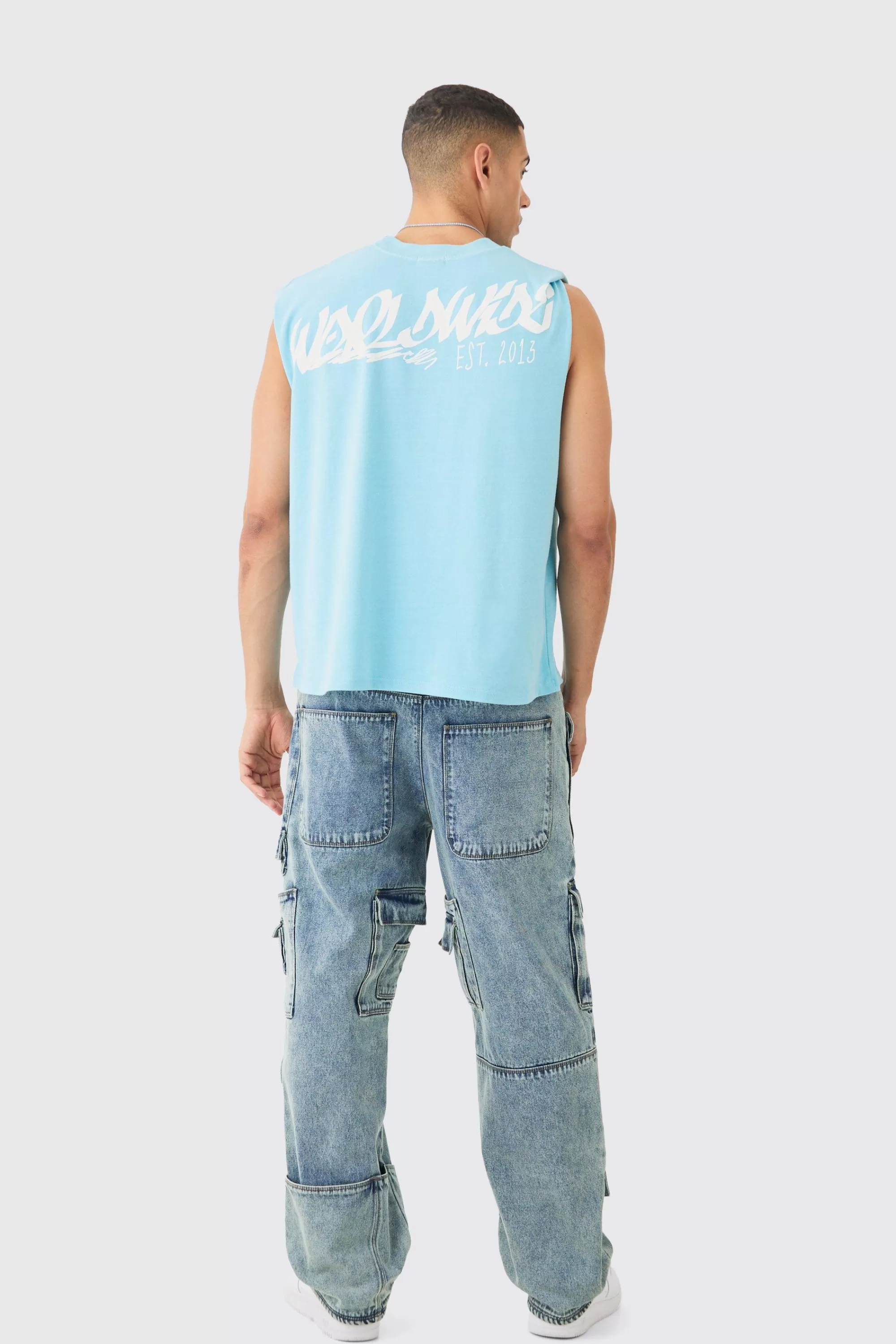 boohooMAN Relaxed Rigid Multi Pocket Cargo Jeans In Tinted Blue | UK