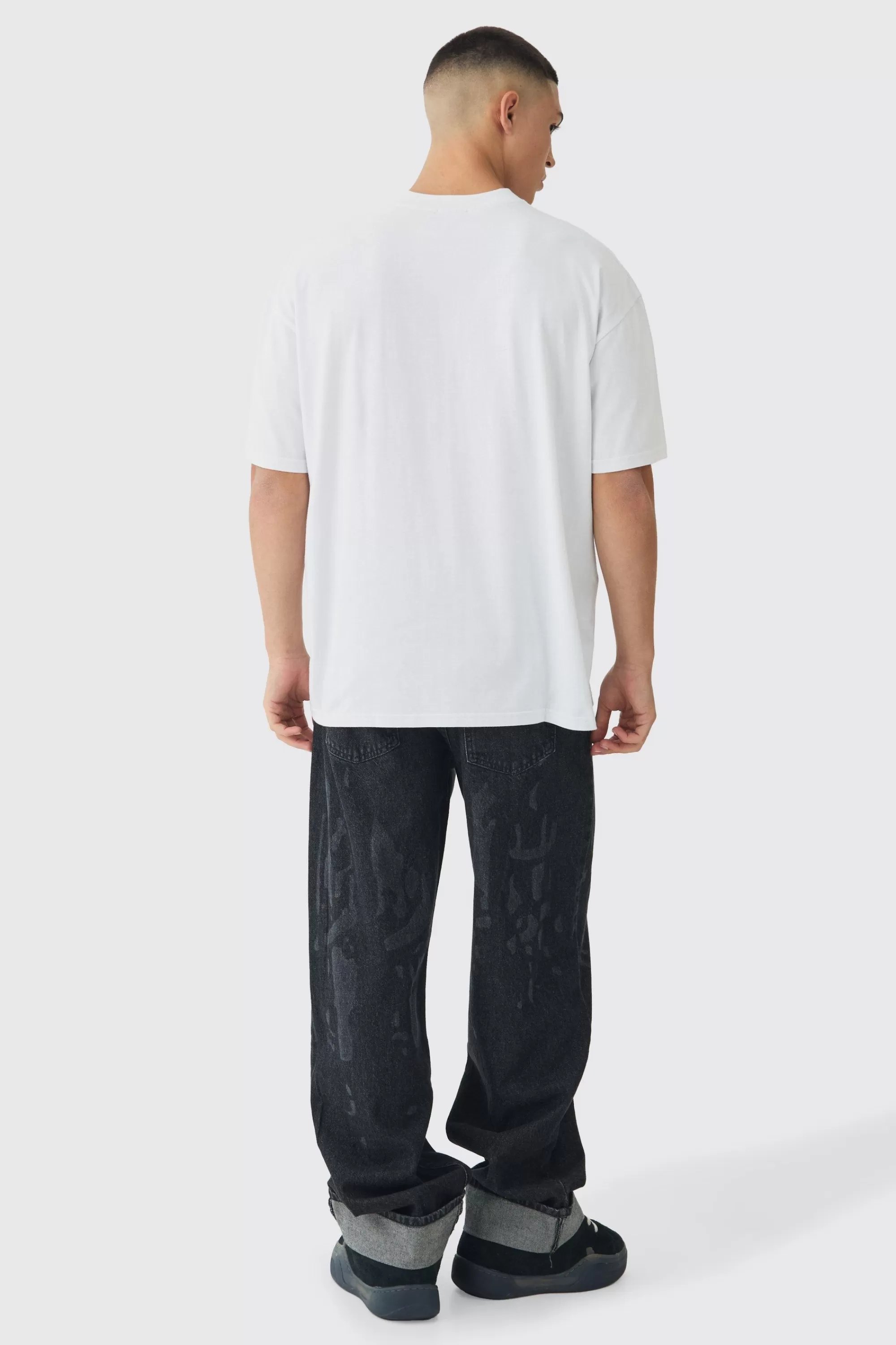 boohooMAN Relaxed Rigid Skeleton Printed Jeans With Chain | UK