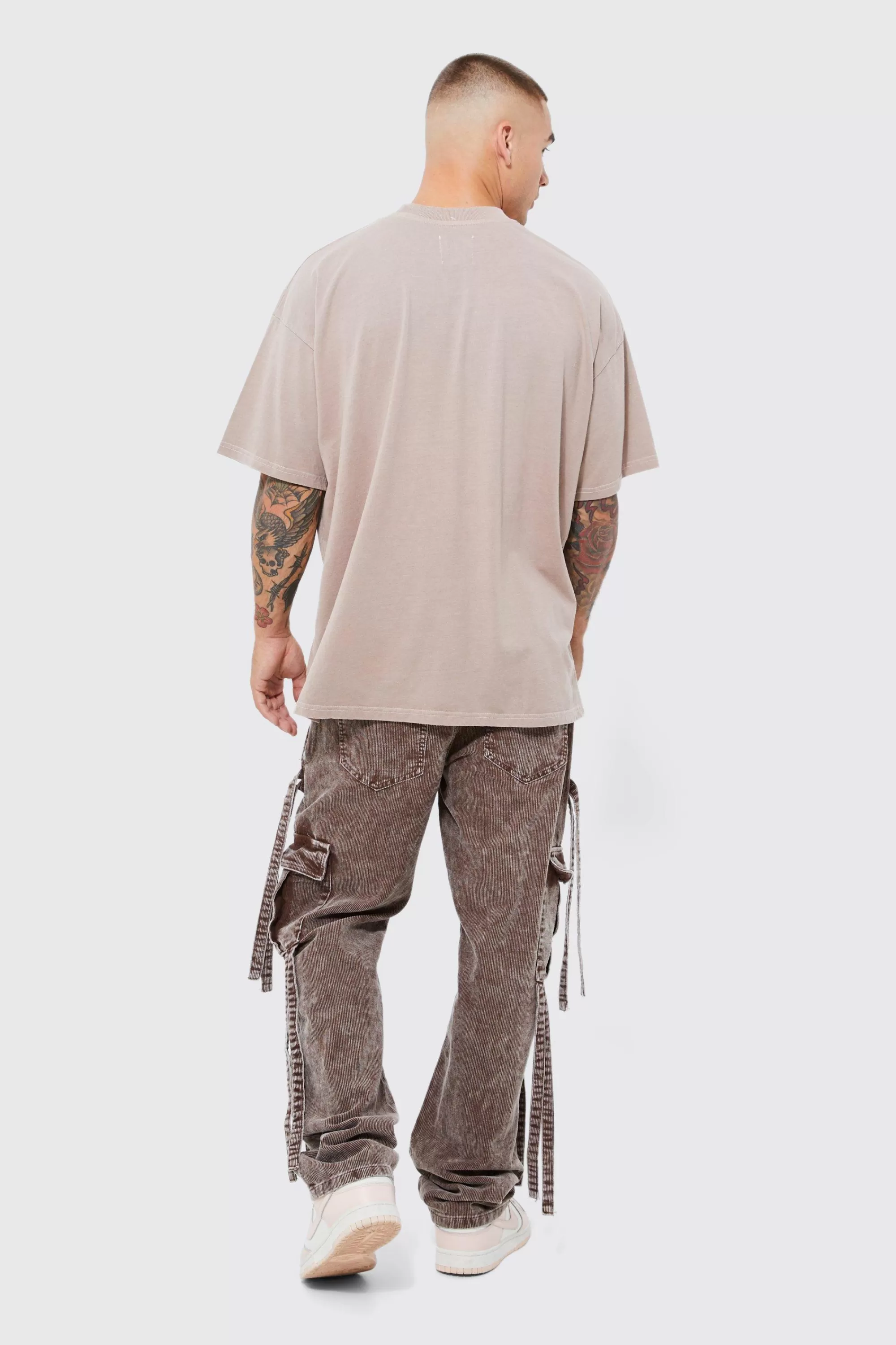 boohooMAN Relaxed Strap Detail Acid Wash Corduroy Trousers | UK