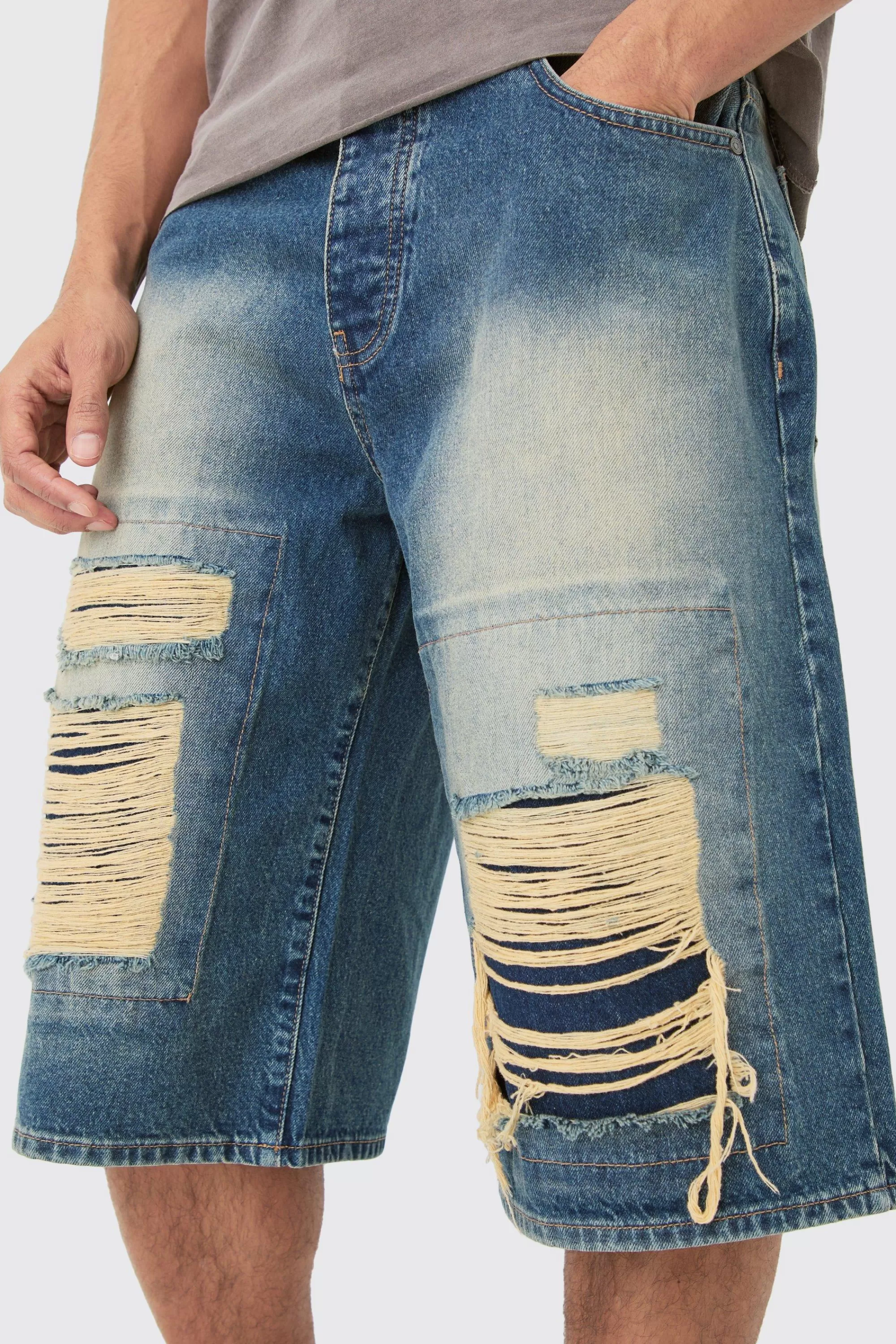 boohooMAN Rigid Extreme Ripped Denim Jorts In | UK