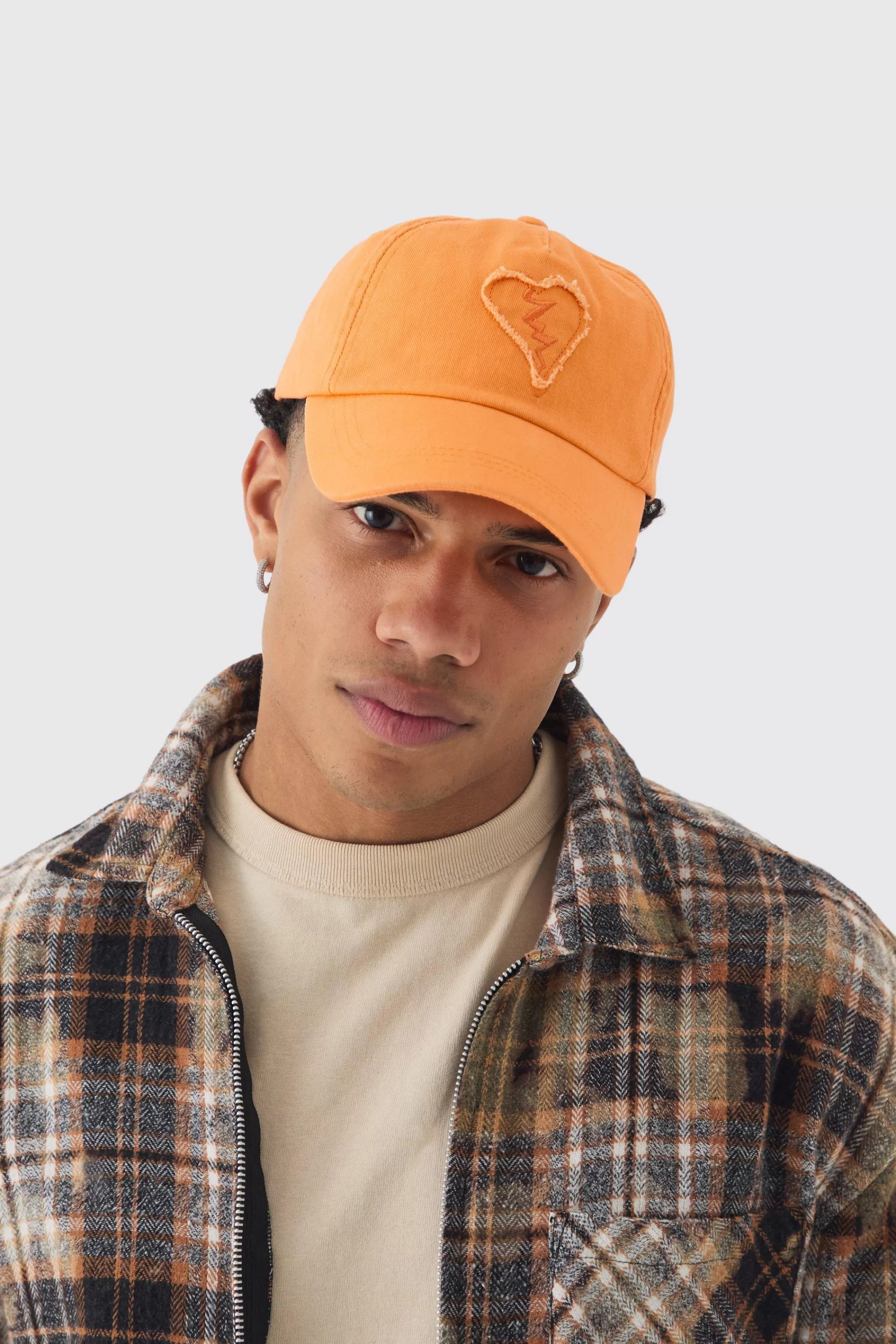 boohooMAN Self Fabric Heart Applique Trucker Cap In | UK