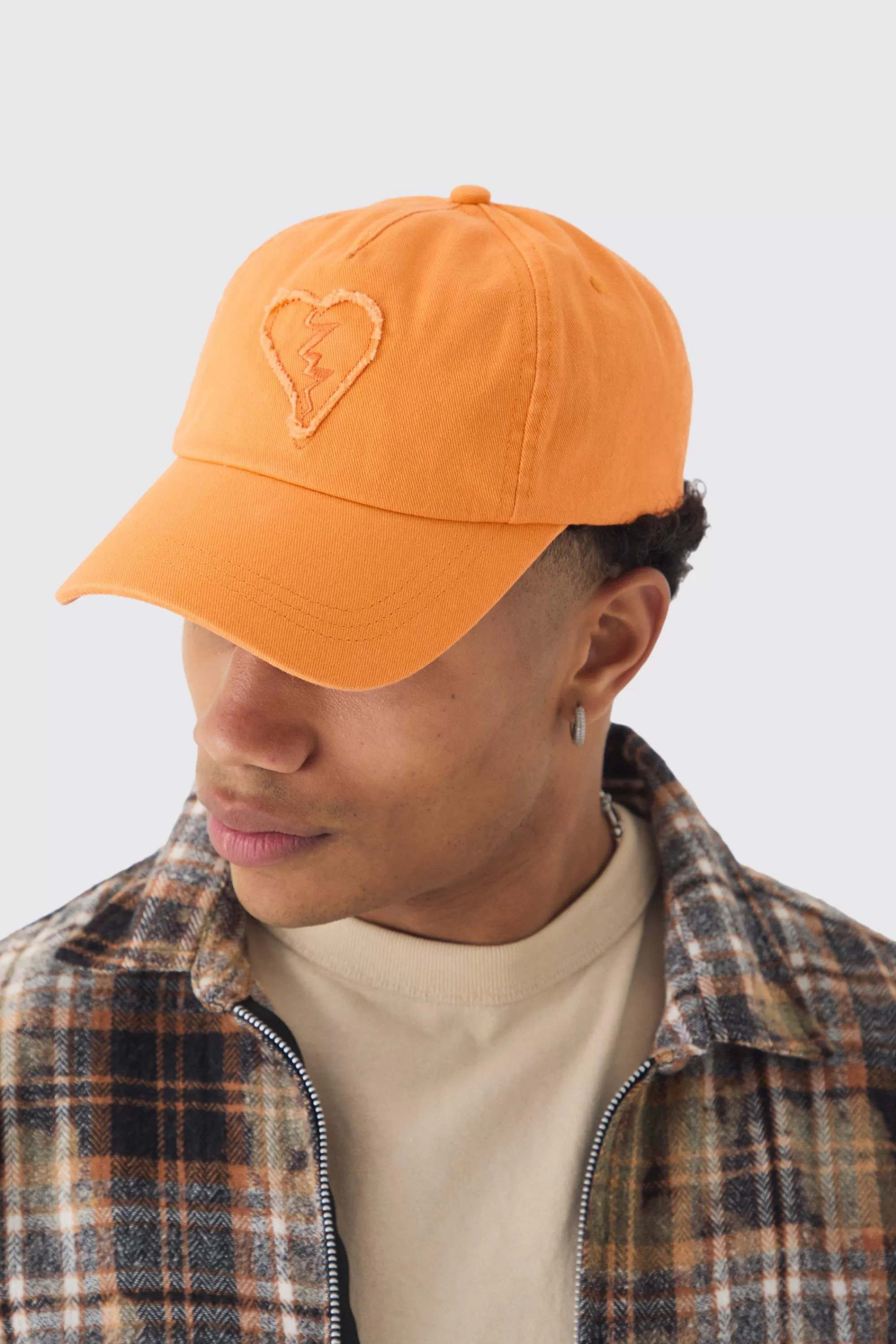 boohooMAN Self Fabric Heart Applique Trucker Cap In | UK