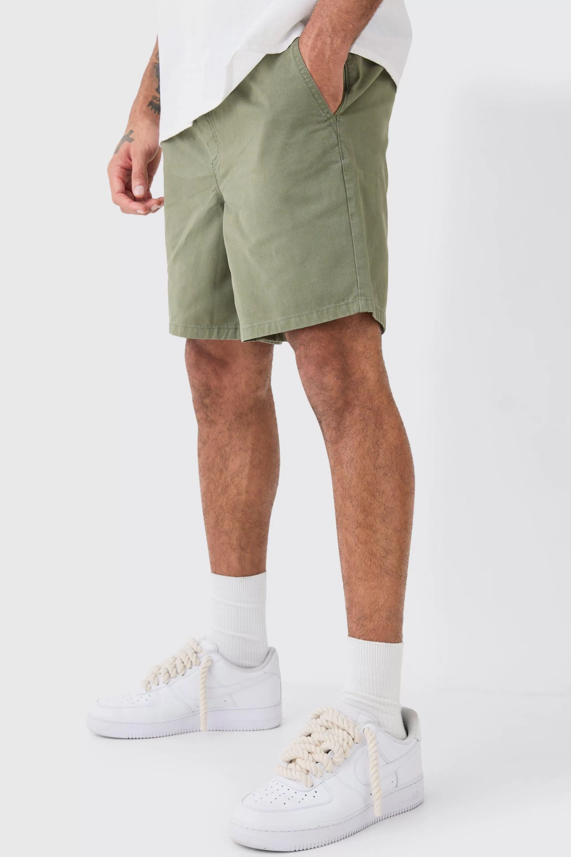 boohooMAN Shorter Length Relaxed Fit Elasticated Waist Chino Shorts In | UK