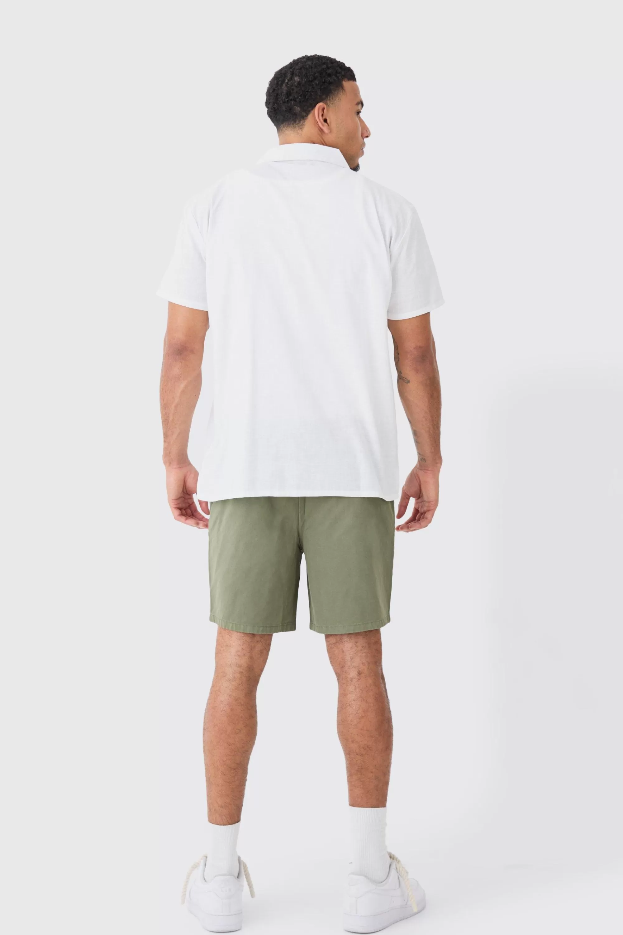 boohooMAN Shorter Length Relaxed Fit Elasticated Waist Chino Shorts In | UK