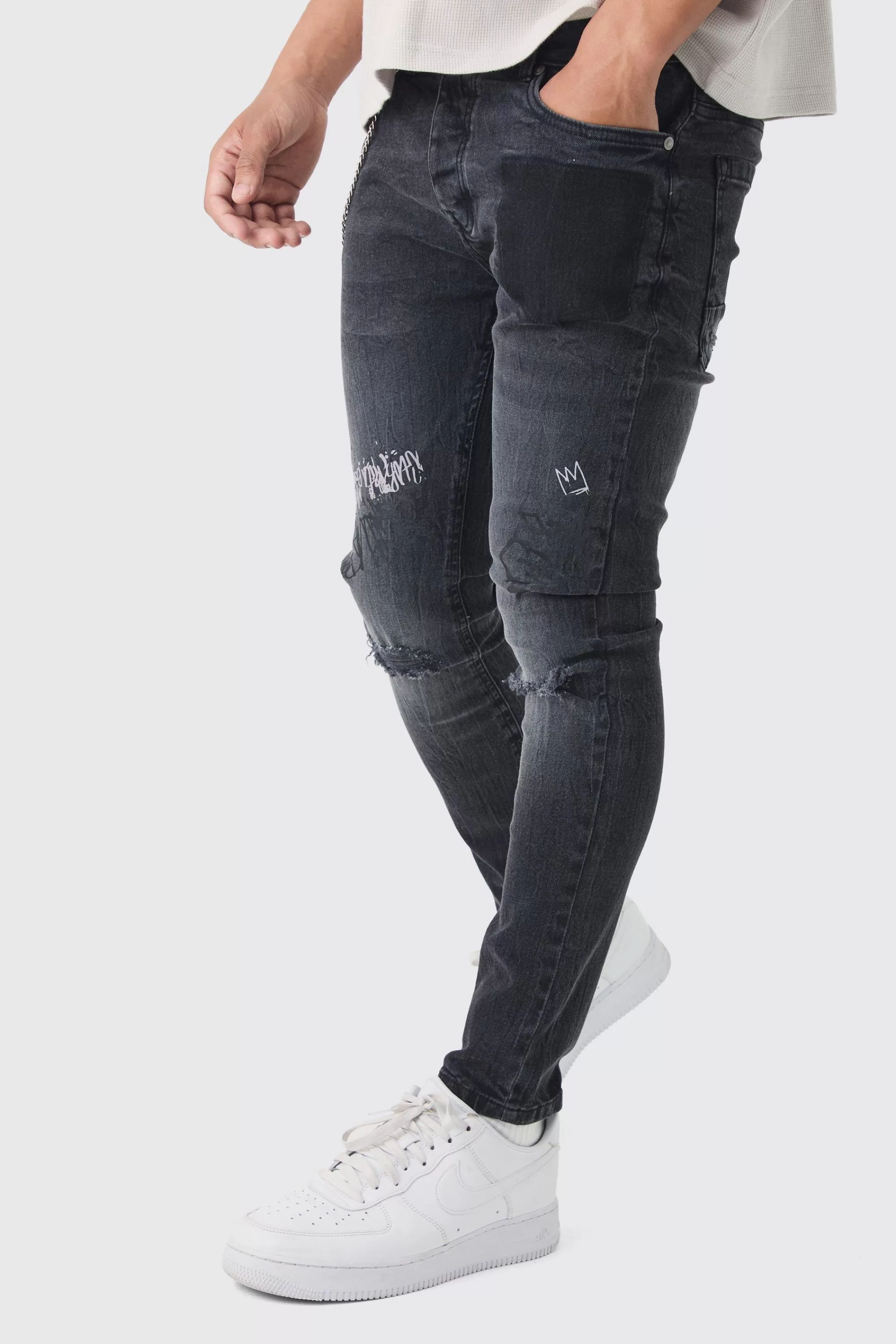 boohooMAN Skinny Fit Graffiti Ripped Jeans With Chain | UK