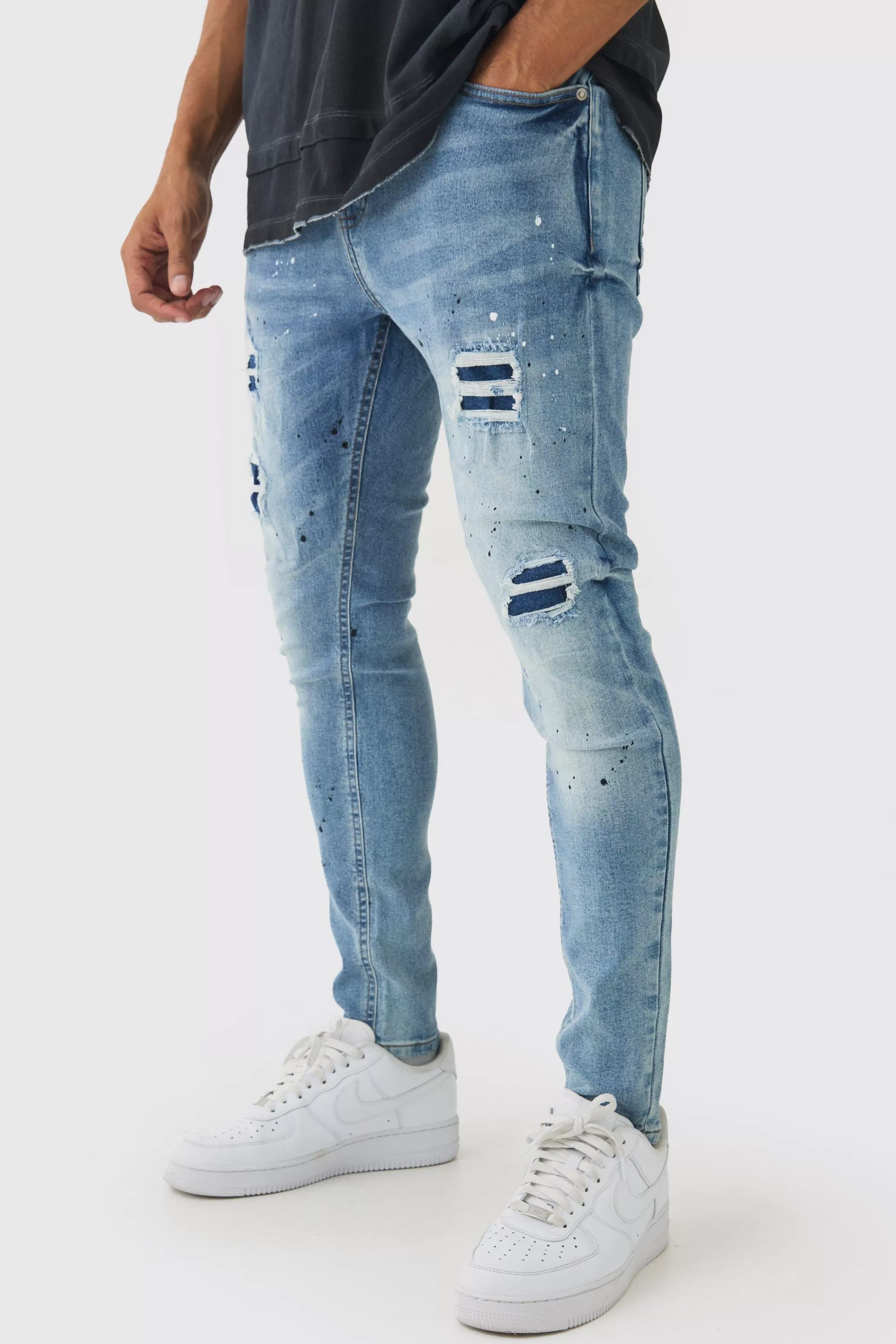 boohooMAN Skinny Fit Rip & Repair Paint Splatter Jeans | UK