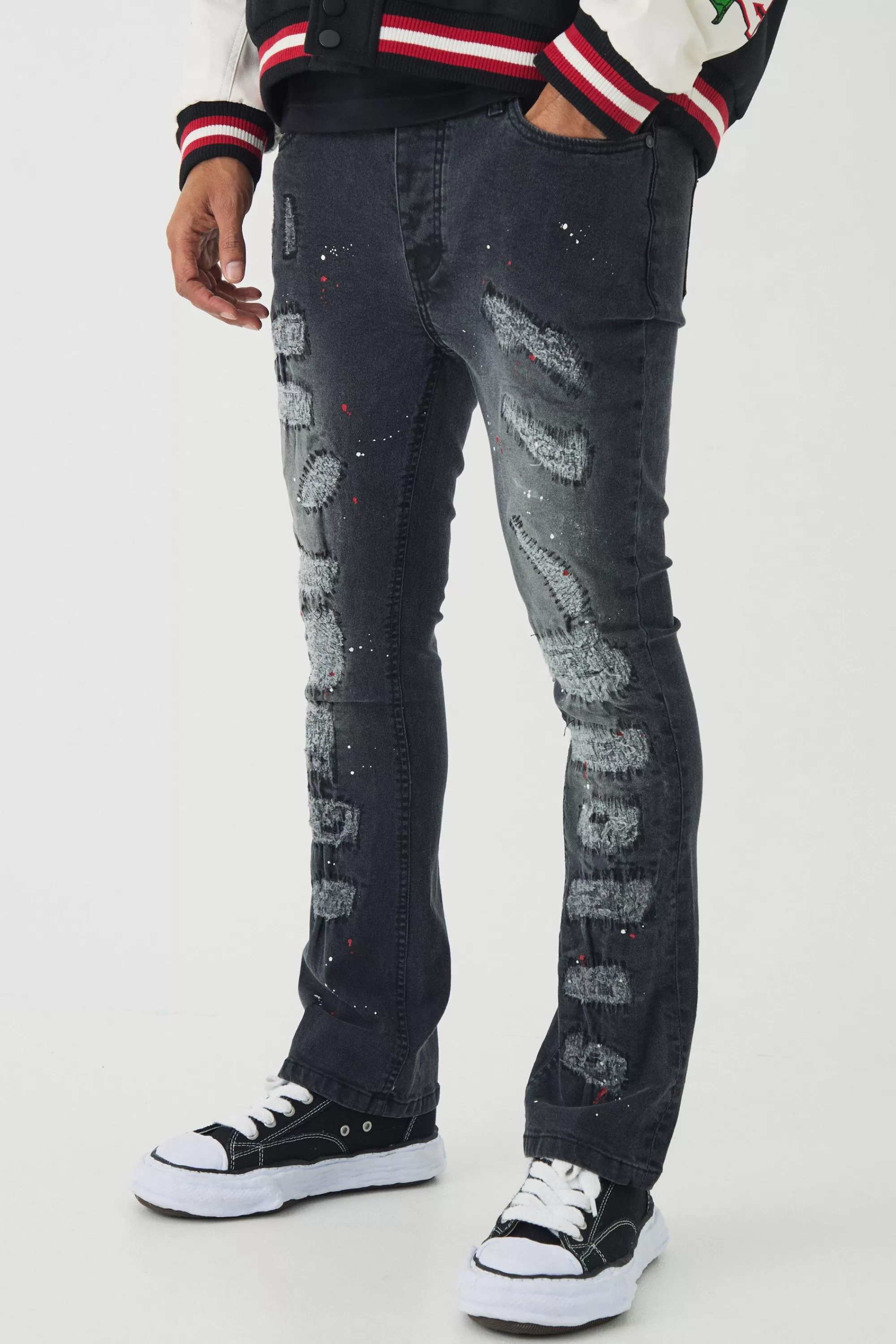 boohooMAN Skinny Flared Ripped Stitch Detail Paint Splatter Jeans | UK