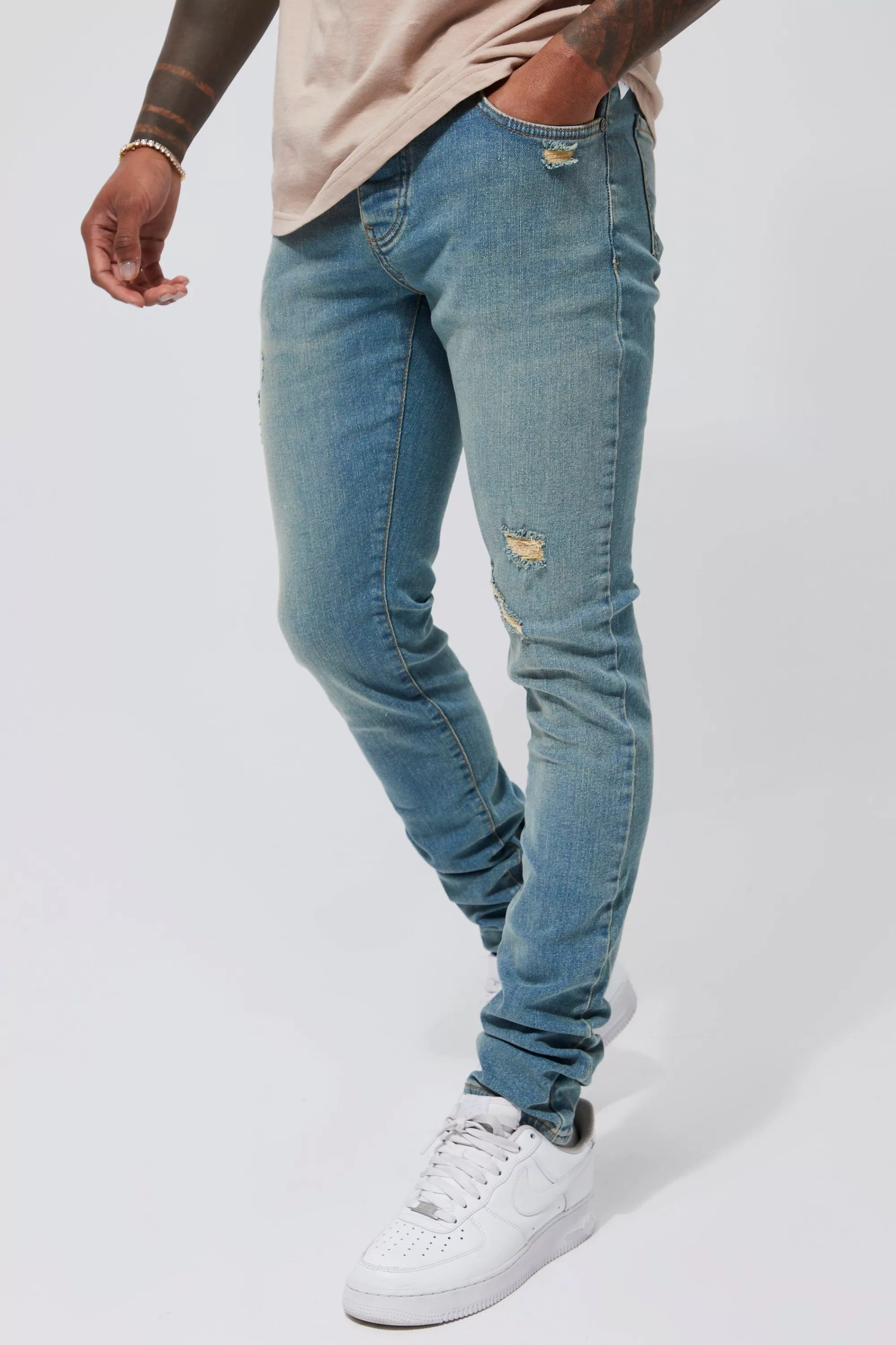 boohooMAN Skinny Stacked Stretch Distressed Jeans | UK