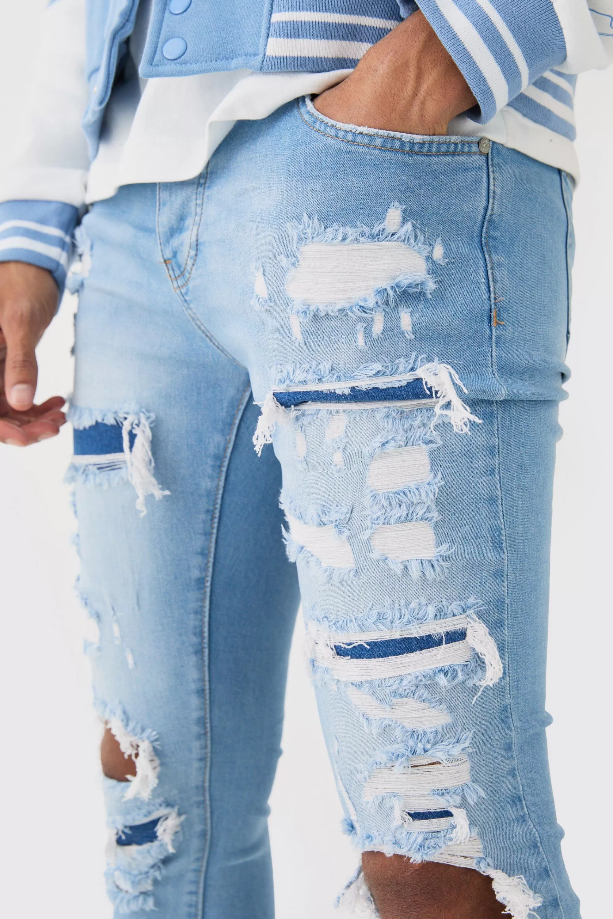 boohooMAN Skinny Stretch All Over Rip Bleached Denim Jean In | UK