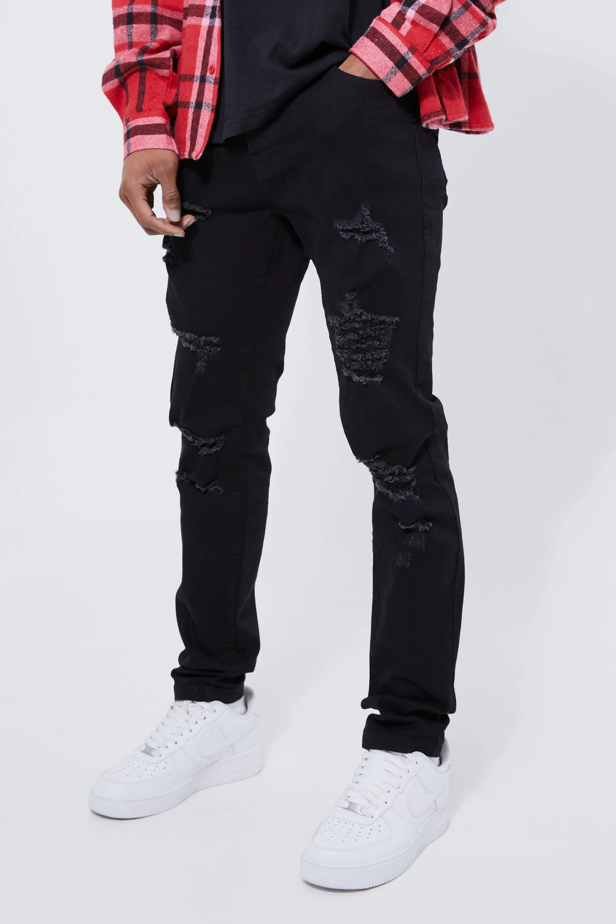 boohooMAN Skinny Stretch All Over Rip Jeans | UK