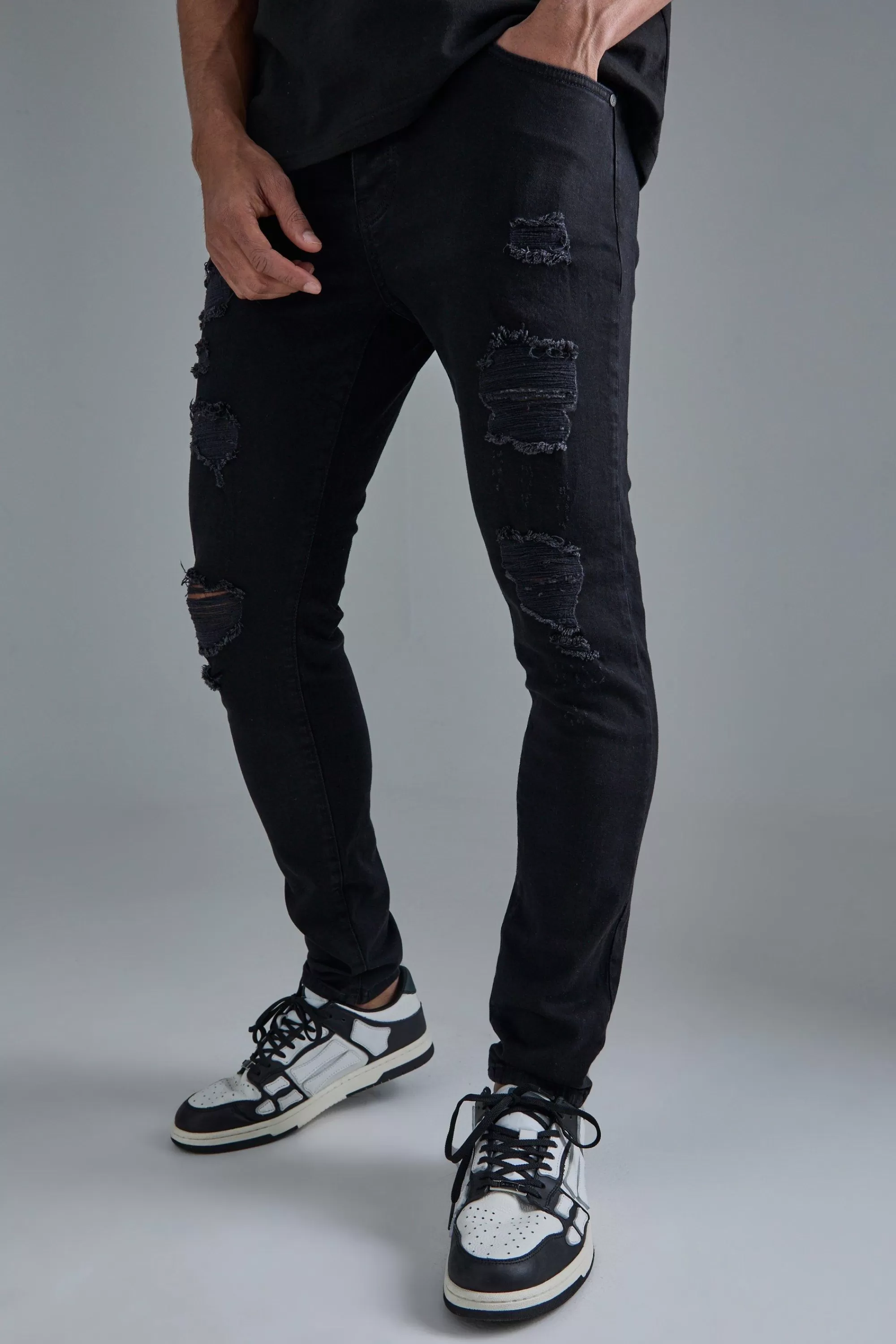 boohooMAN Skinny Stretch All Over Rip Jeans | UK