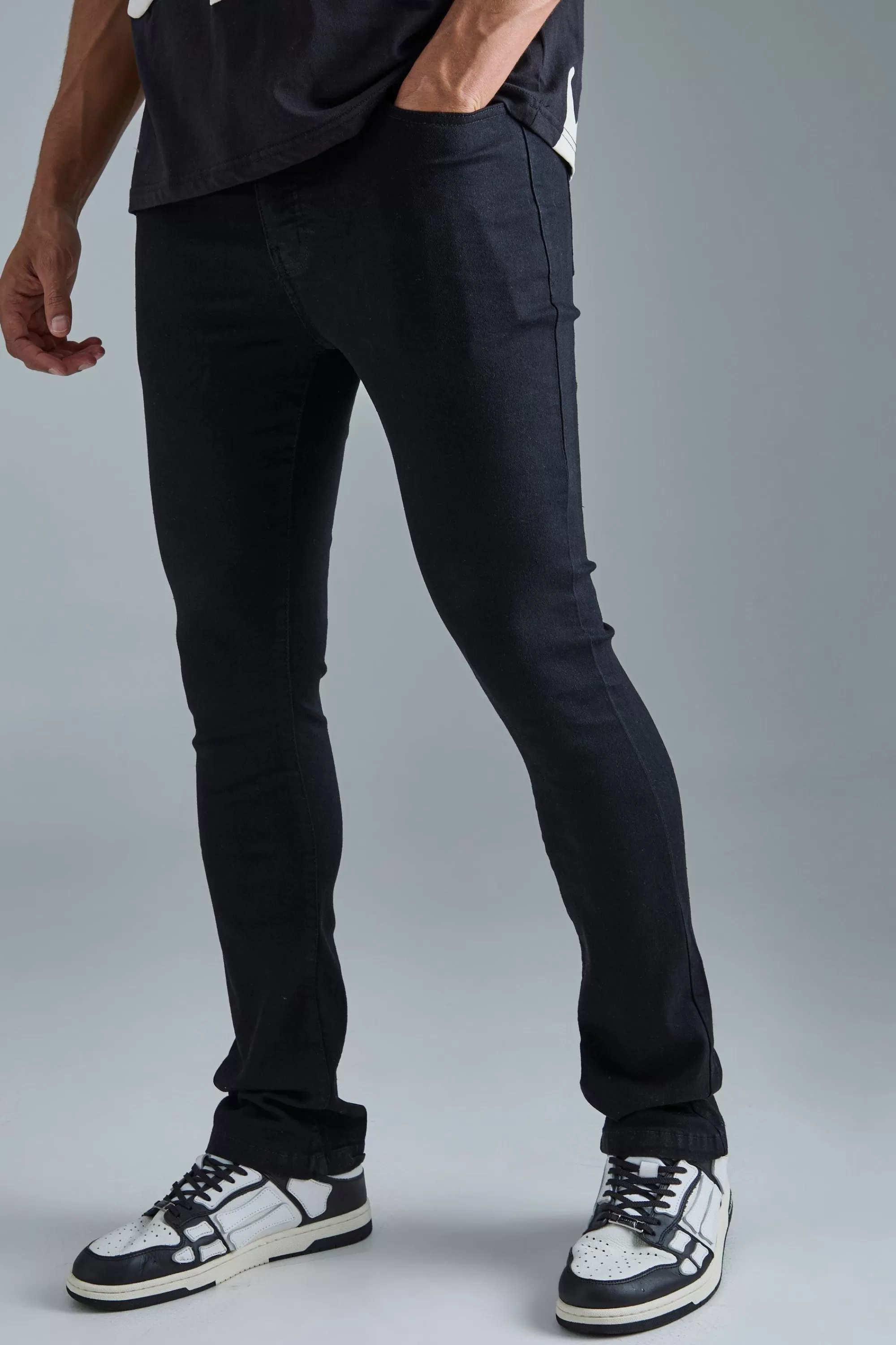 boohooMAN Skinny Stretch Flare Jeans In | UK