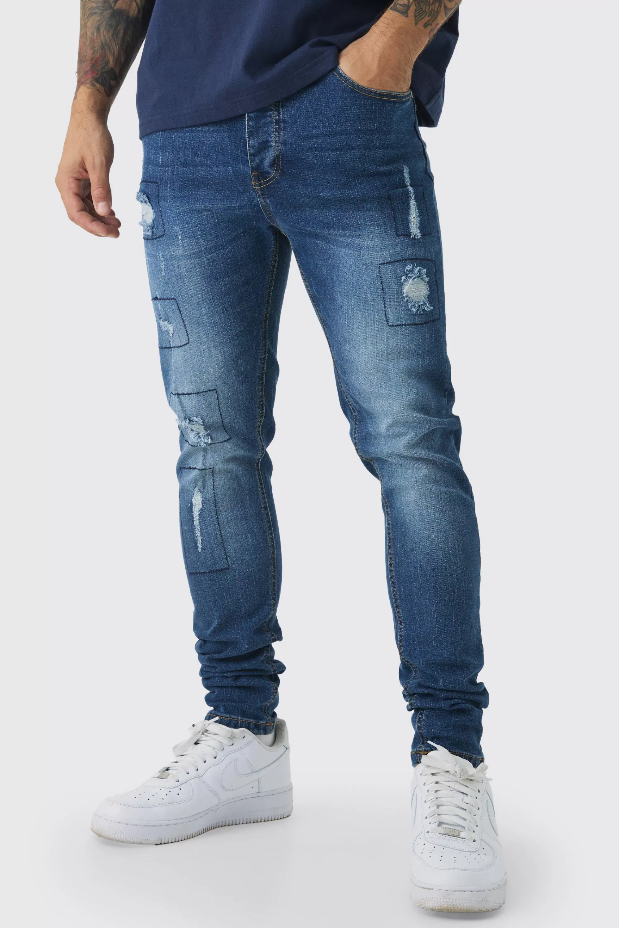 boohooMAN Skinny Stretch Rip & Repair Patchwork Jeans | UK