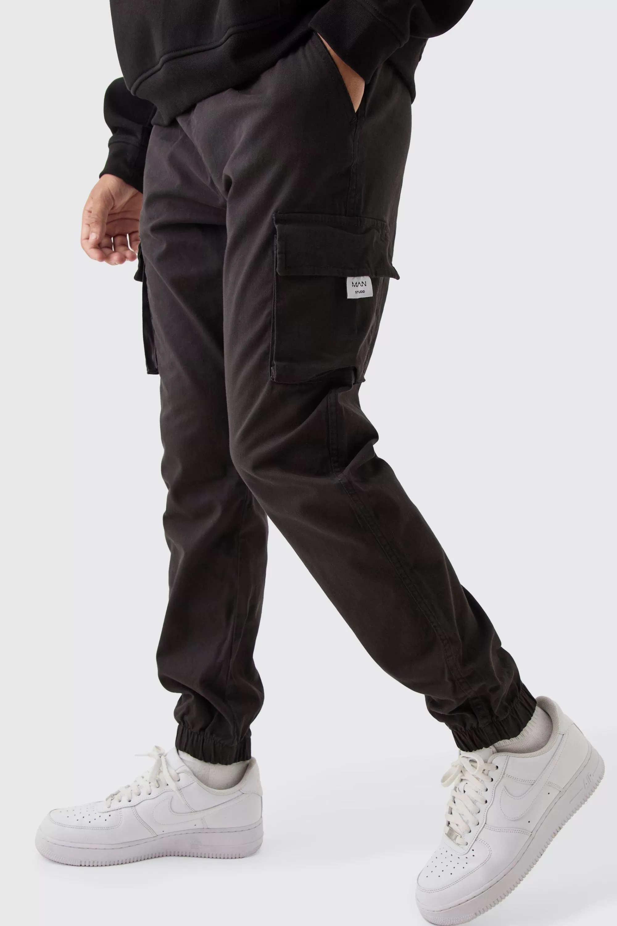 boohooMAN Slim Fit Elasticated Waist Woven Tab Cuffed Cargo Trousers | UK