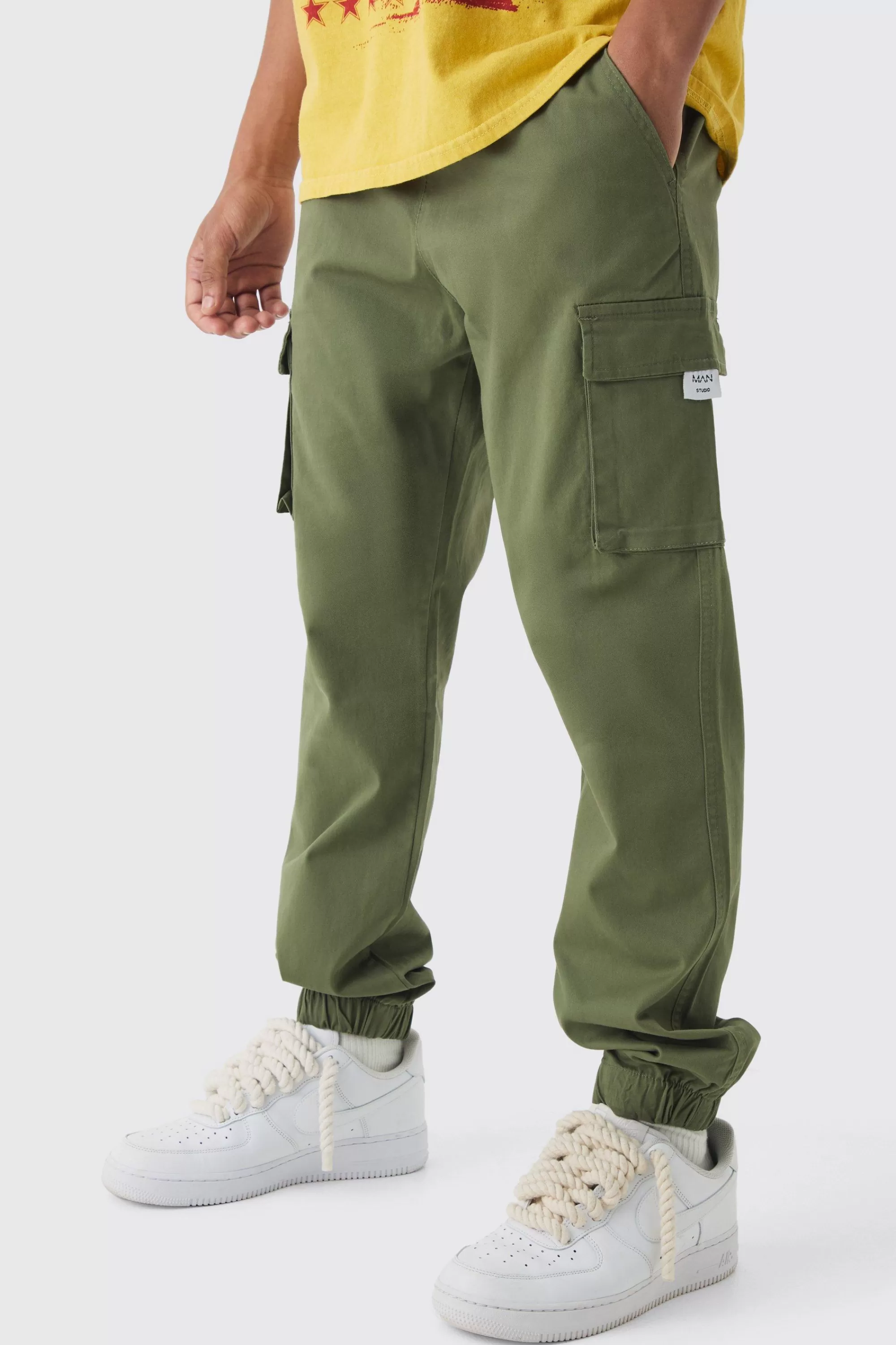 boohooMAN Slim Fit Elasticated Waist Woven Tab Cuffed Cargo Trousers | UK