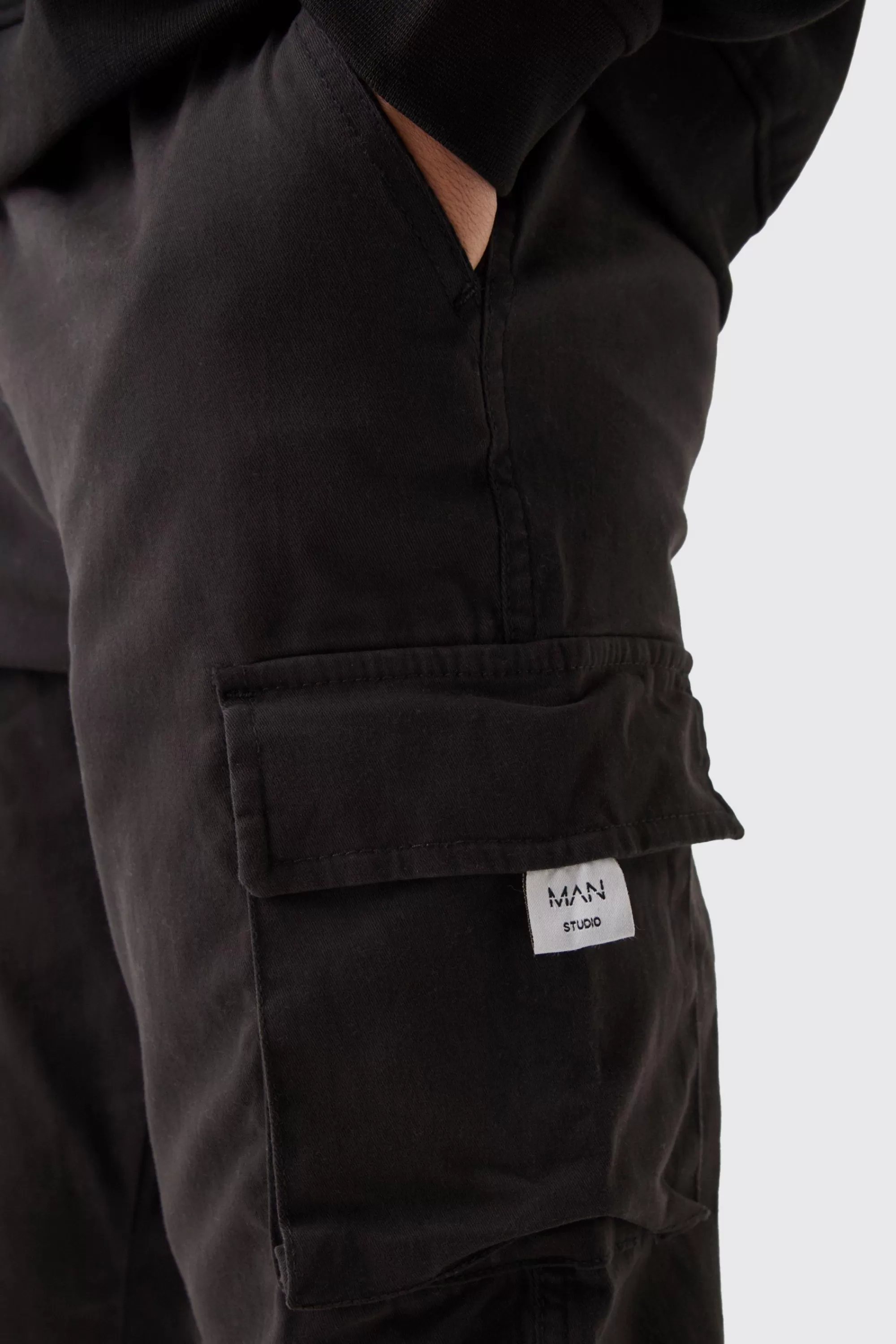 boohooMAN Slim Fit Elasticated Waist Woven Tab Cuffed Cargo Trousers | UK