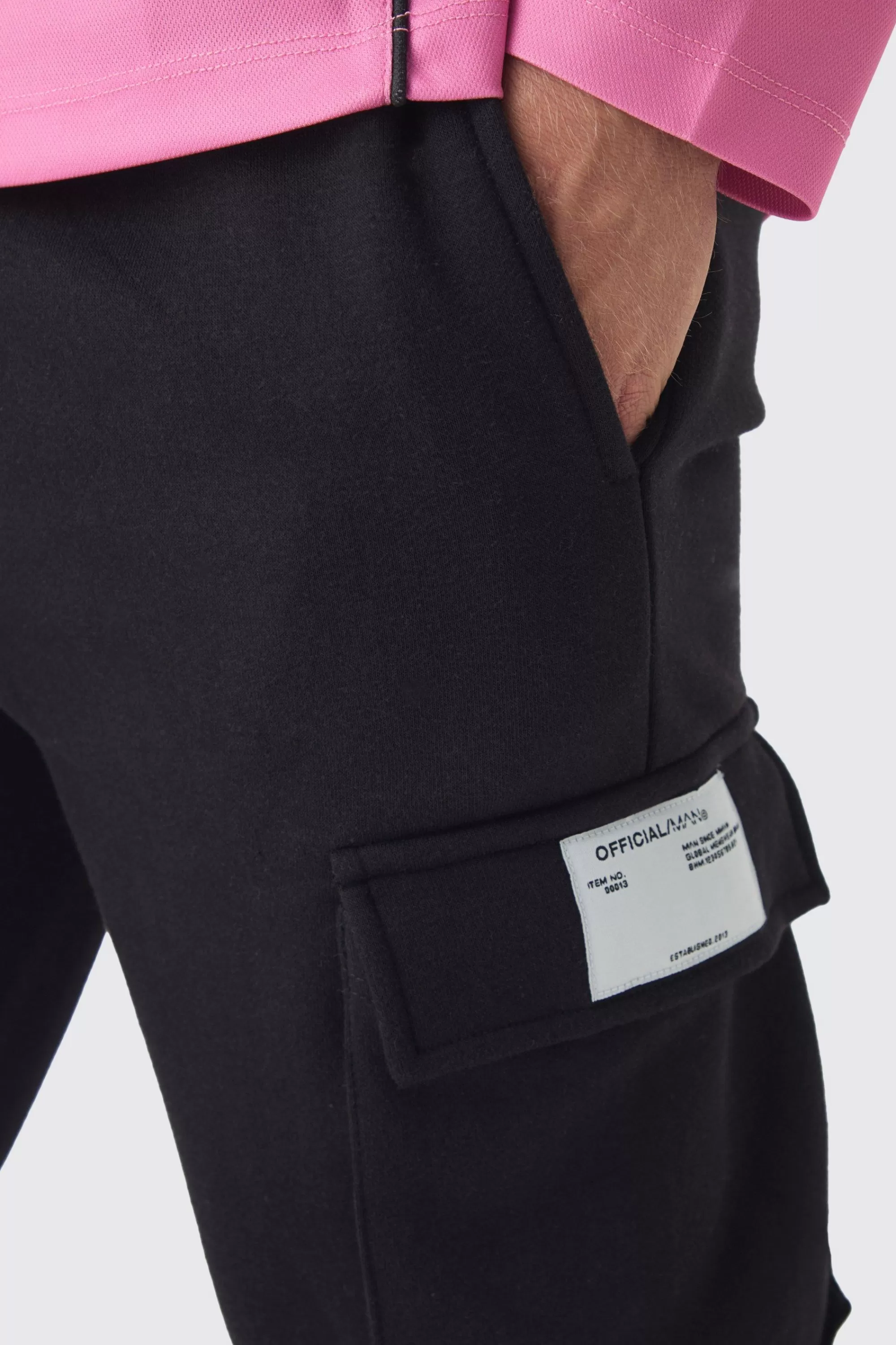 boohooMAN Slim Fit Extreme Stacked Woven Tab Cargo Jogger | UK