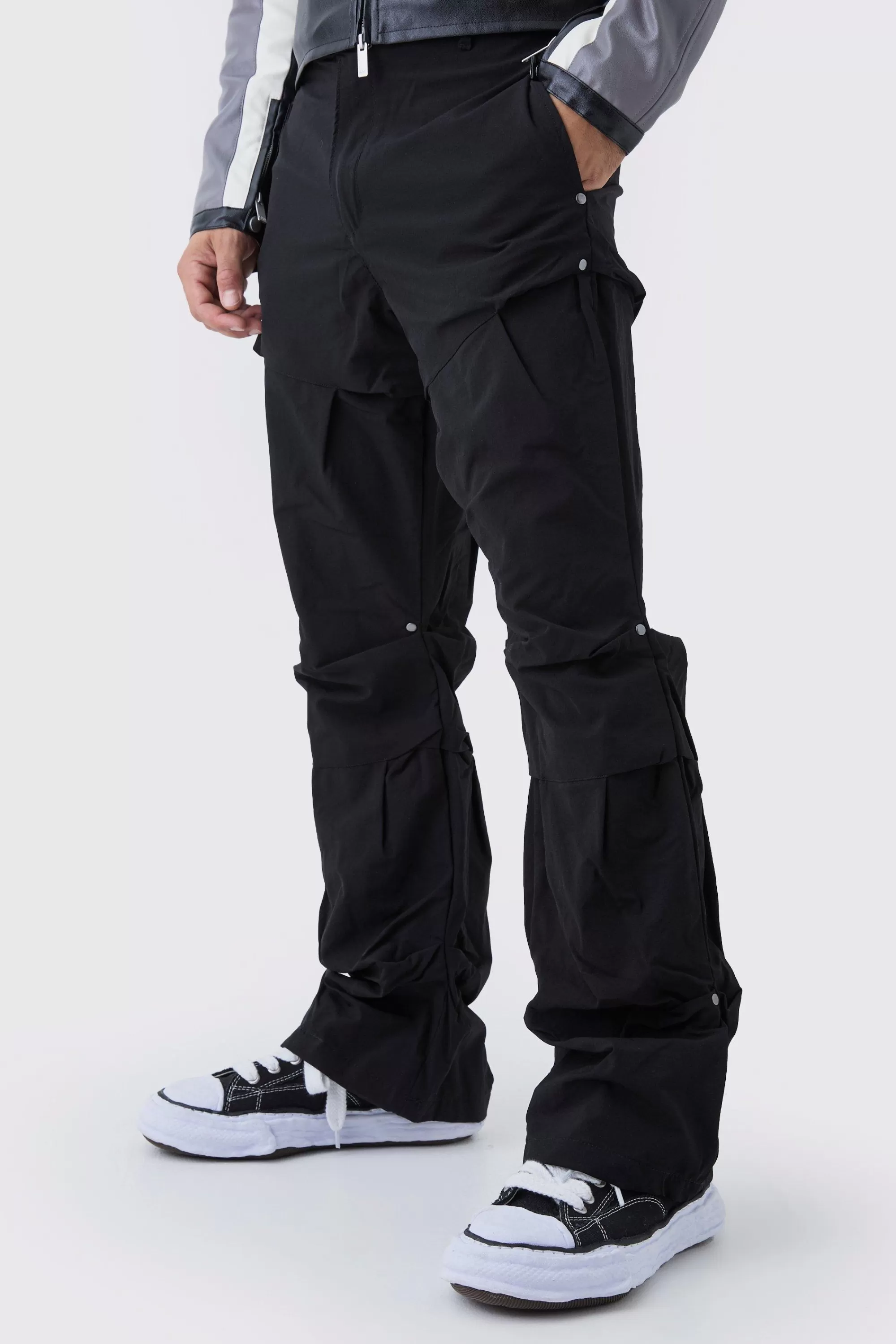 boohooMAN Slim Fit Flare Stacked Trousers With Ruched Detail | UK