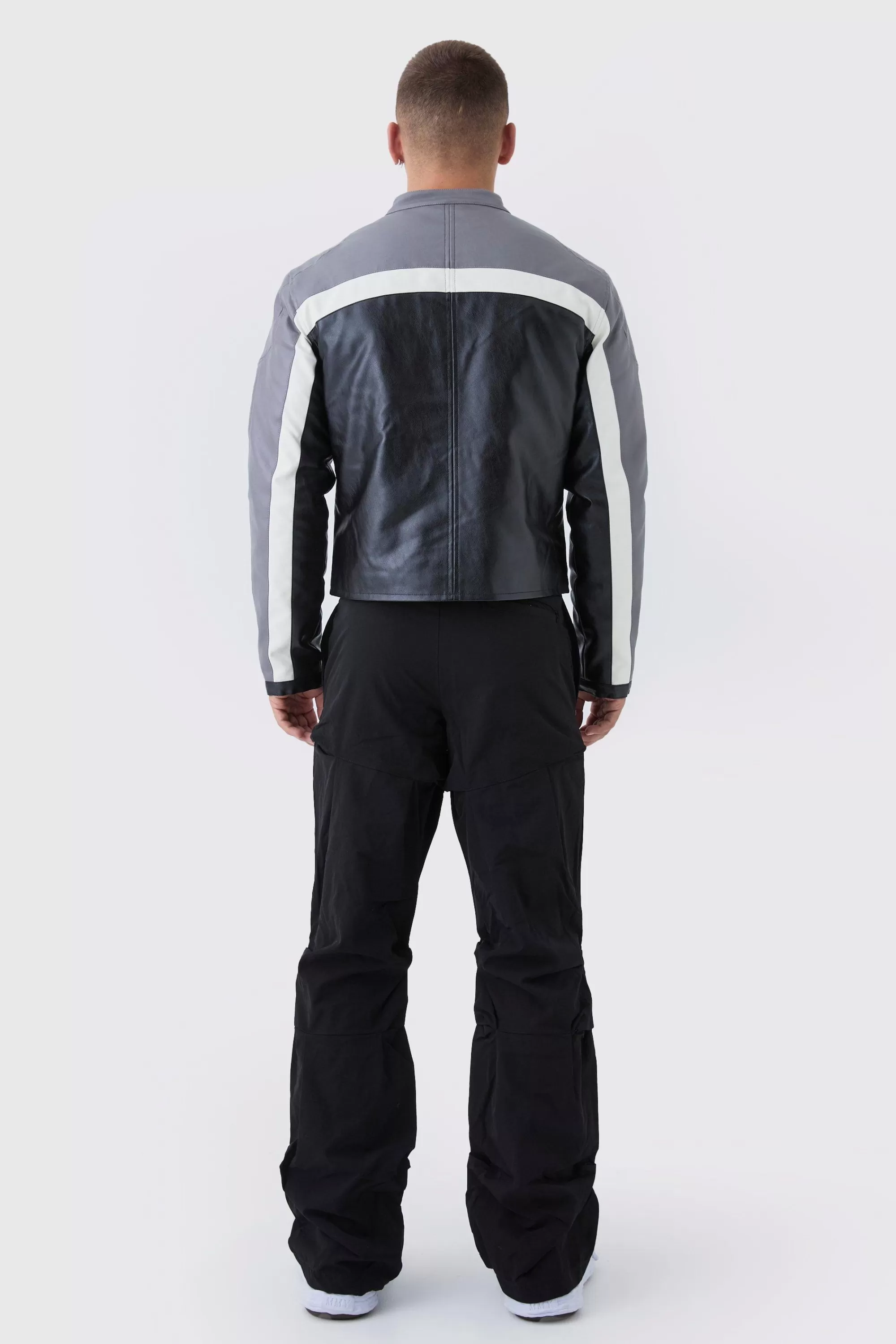 boohooMAN Slim Fit Flare Stacked Trousers With Ruched Detail | UK