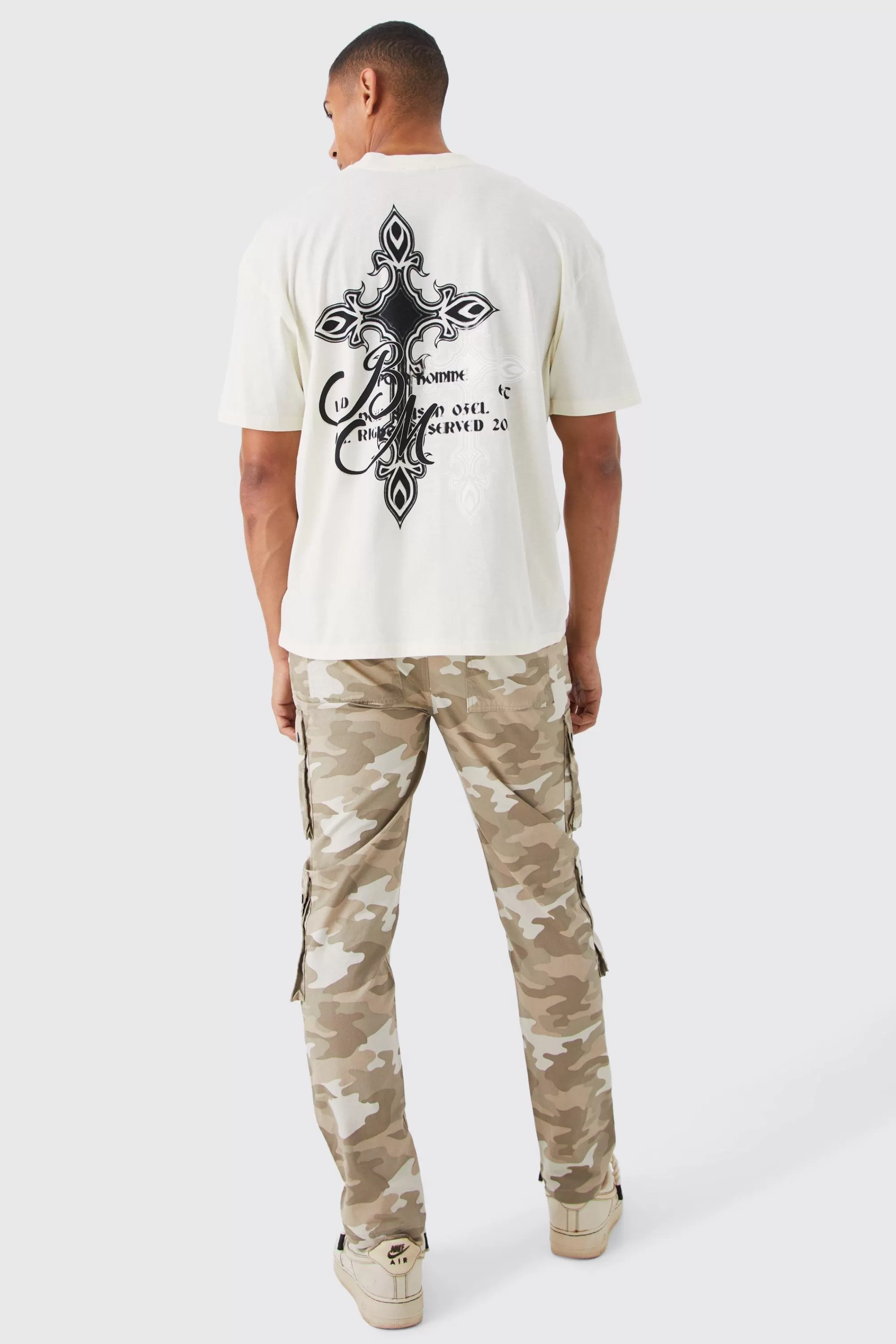 boohooMAN Slim Fit Multi Popper Cargo Camo Trouser | UK