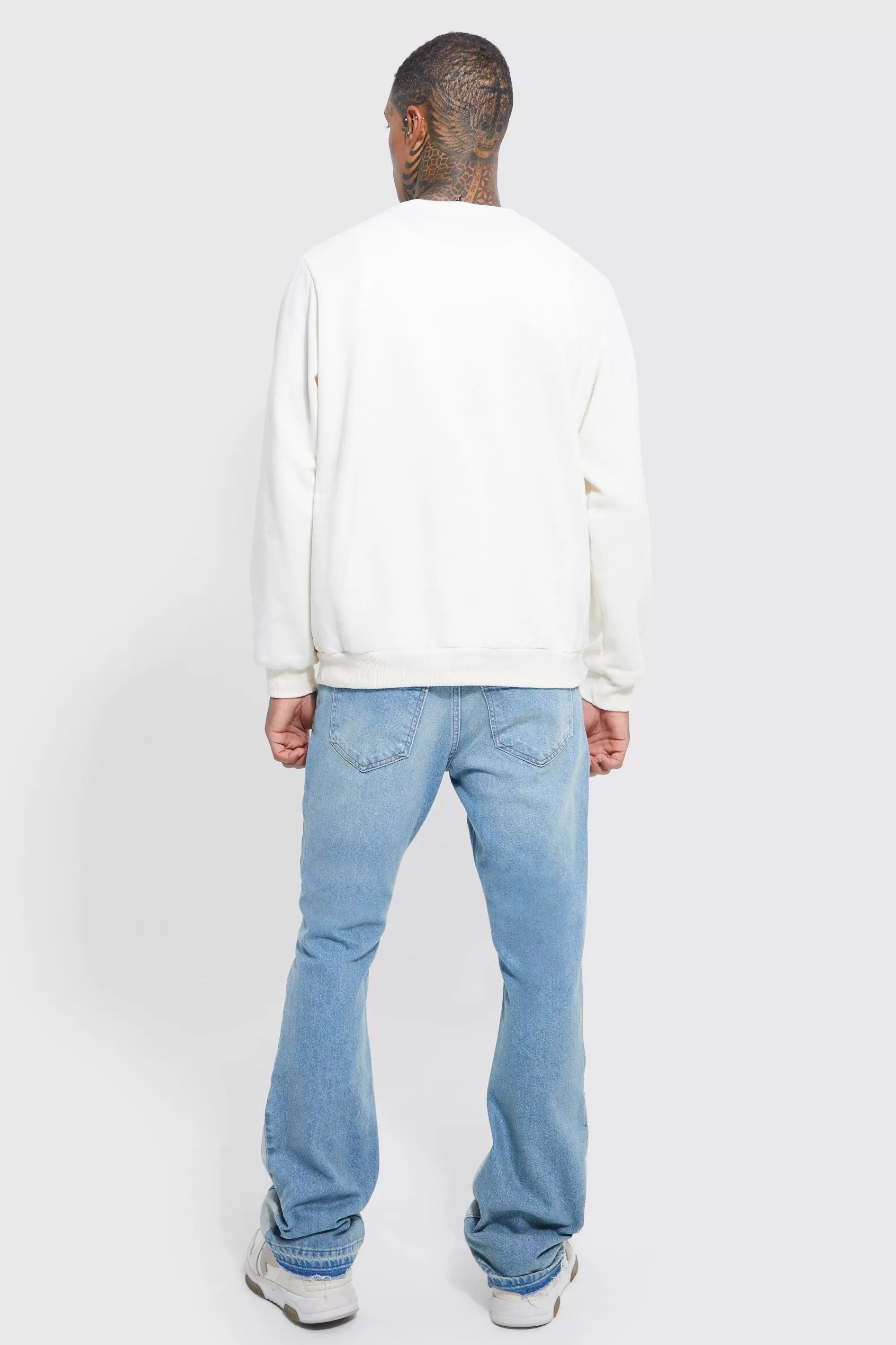 boohooMAN Slim Flare Applique Panel Jeans | UK