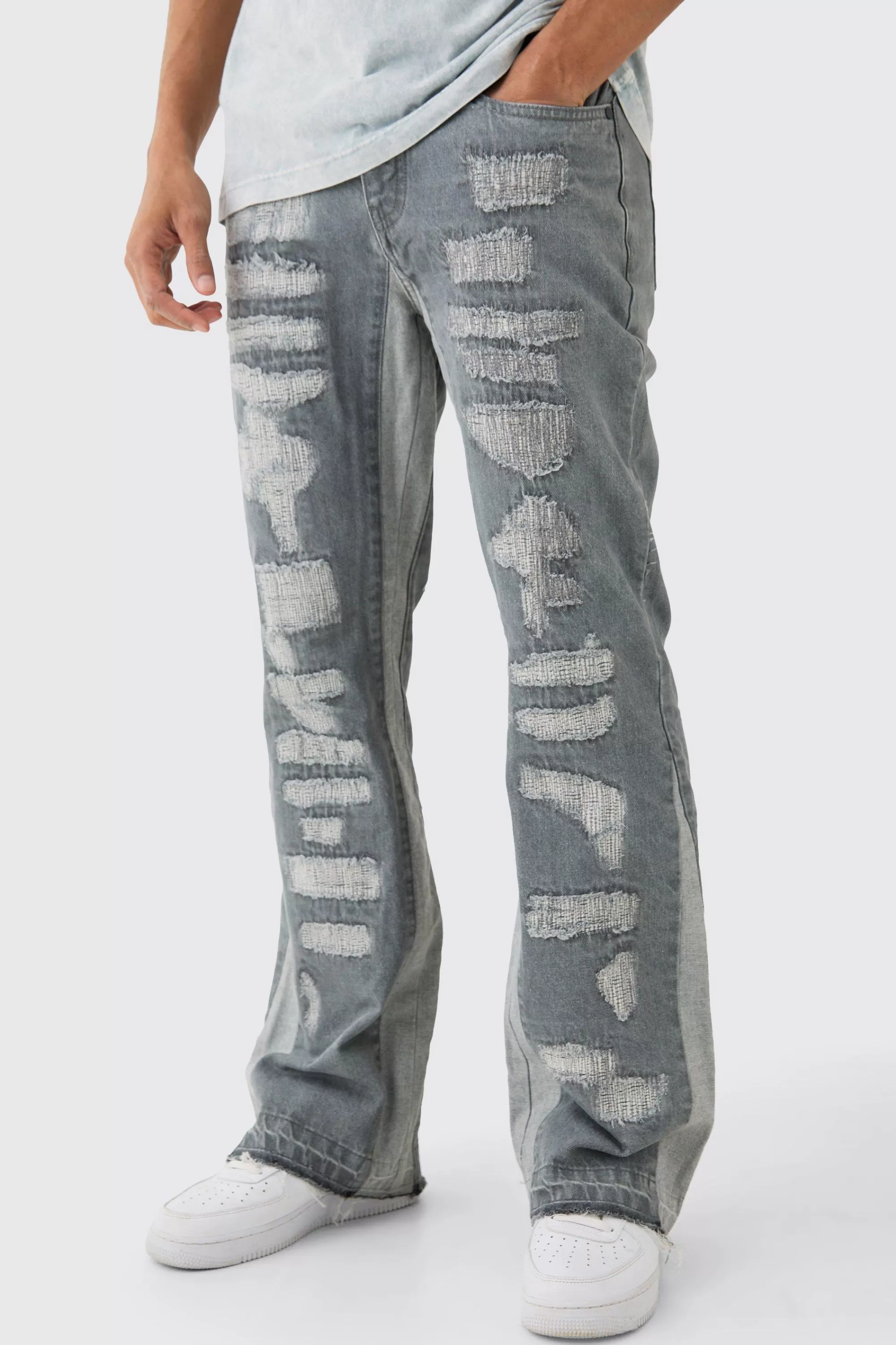 boohooMAN Slim Flare Rigid All Over Rip & Repaired Jeans In Antique | UK