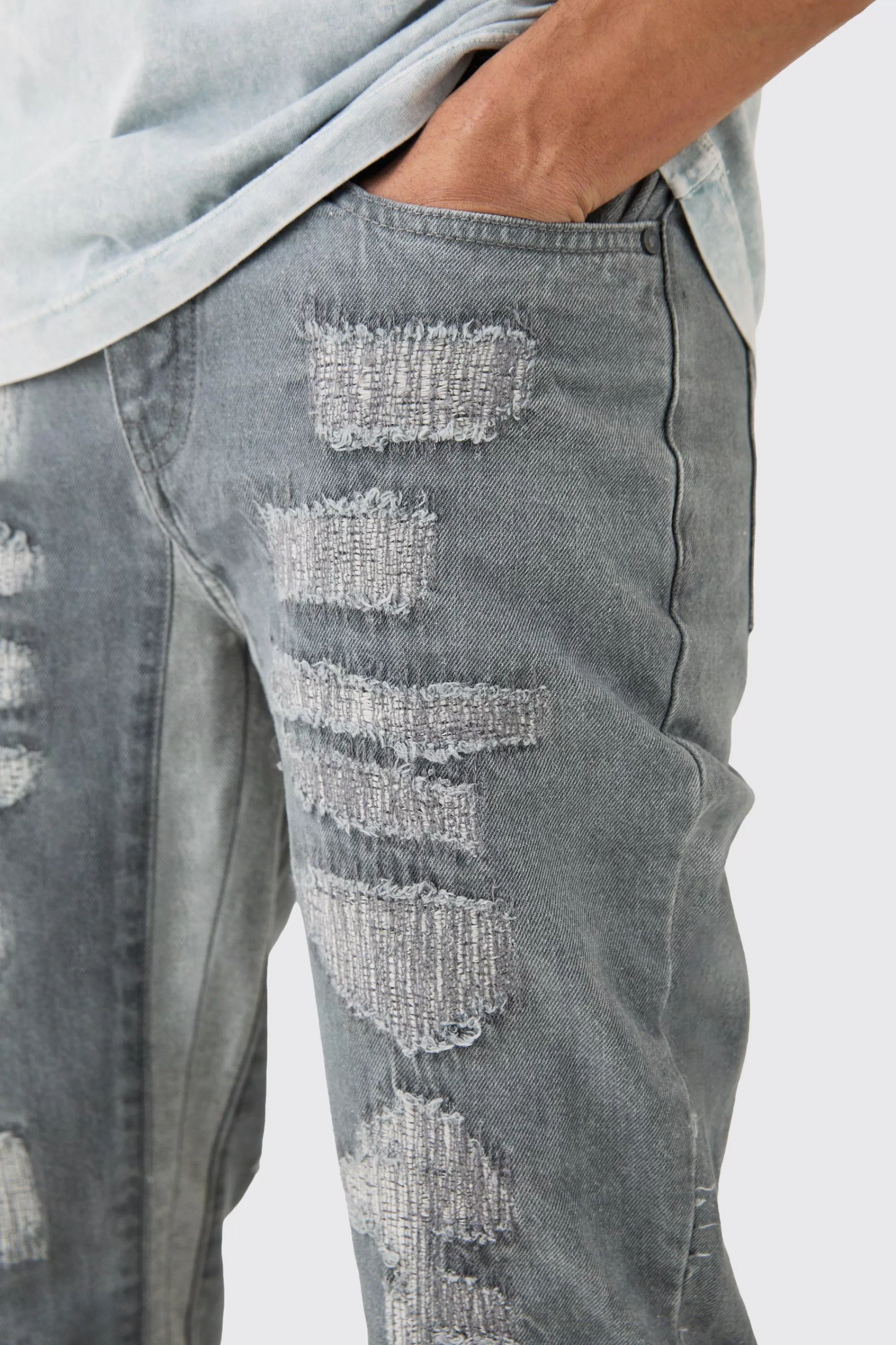 boohooMAN Slim Flare Rigid All Over Rip & Repaired Jeans In Antique | UK