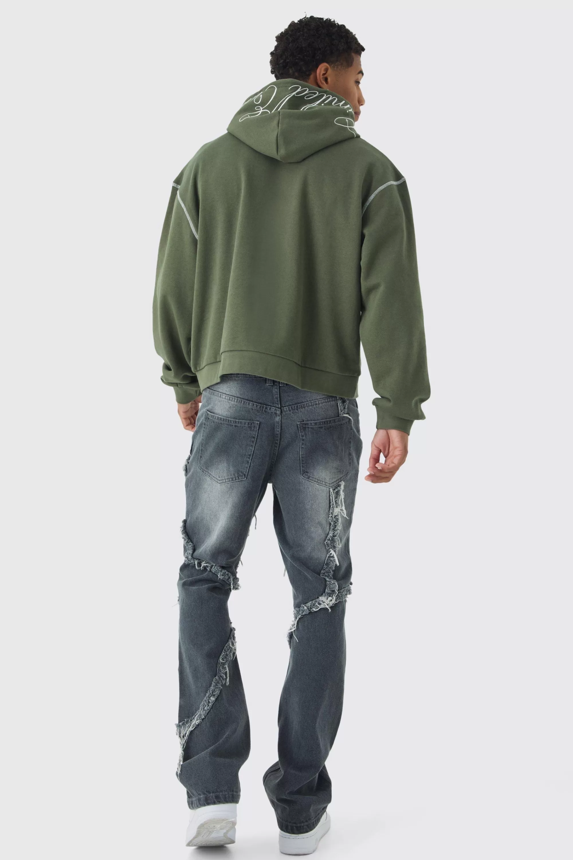 boohooMAN Slim Flared Patchwork Distressed Jeans | UK