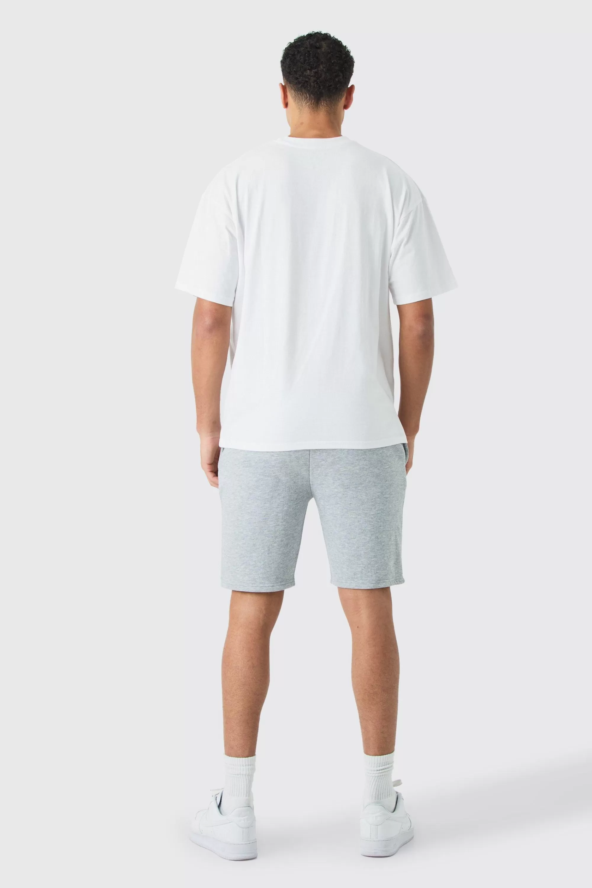 boohooMAN Slim Mid Length Jersey Short | UK