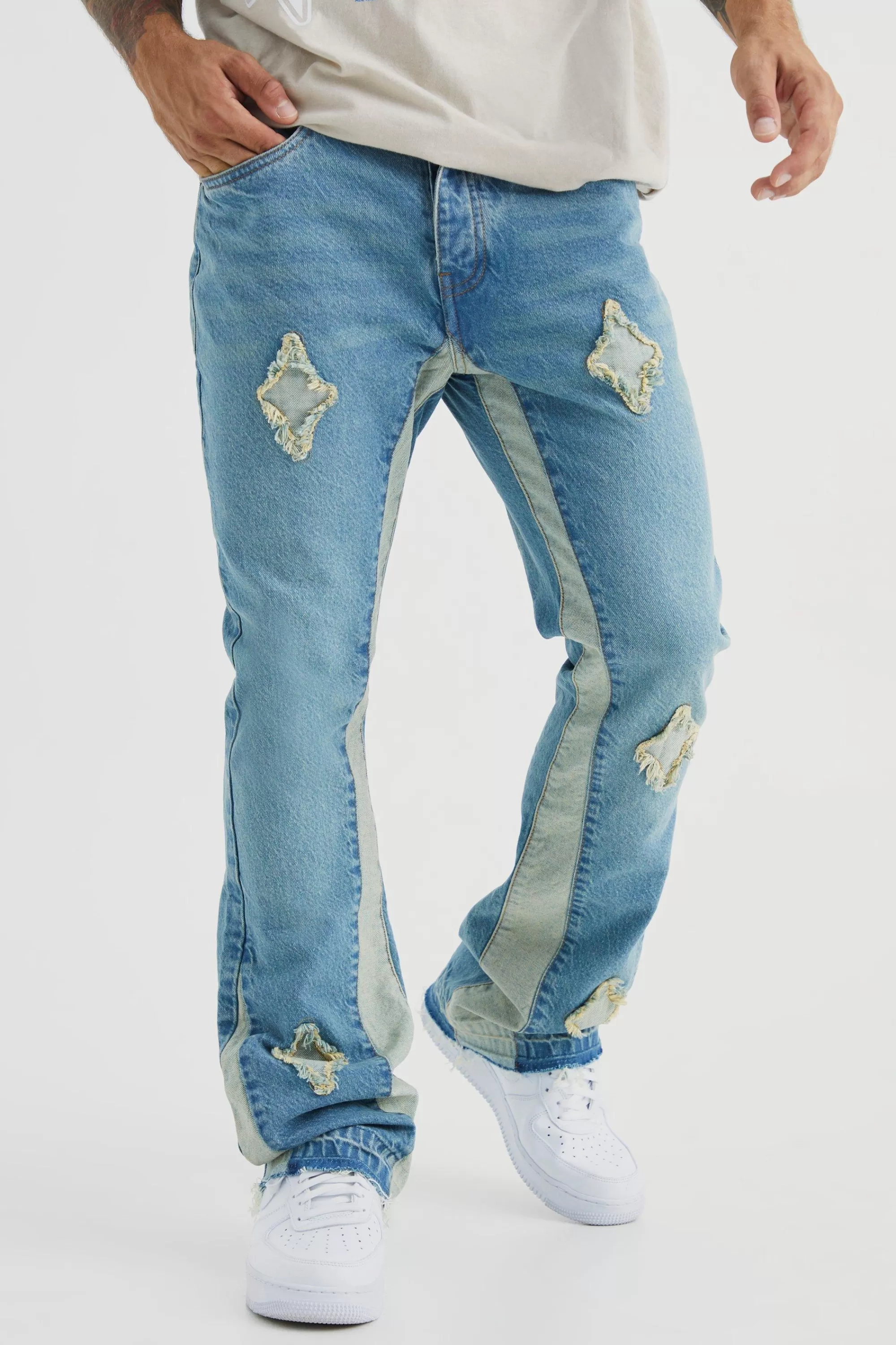 boohooMAN Slim Rigid Flare Applique Panel Jeans | UK