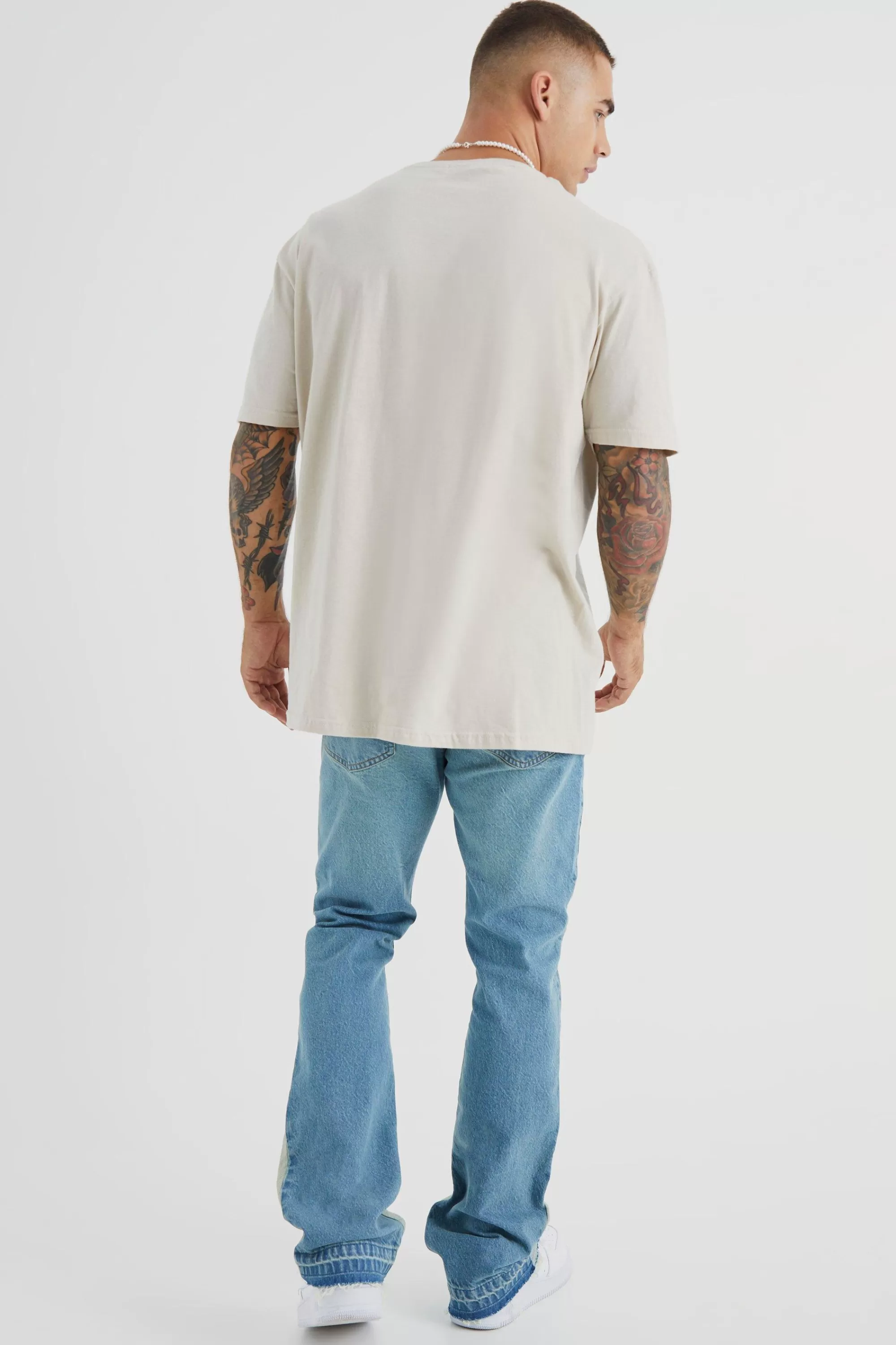 boohooMAN Slim Rigid Flare Applique Panel Jeans | UK