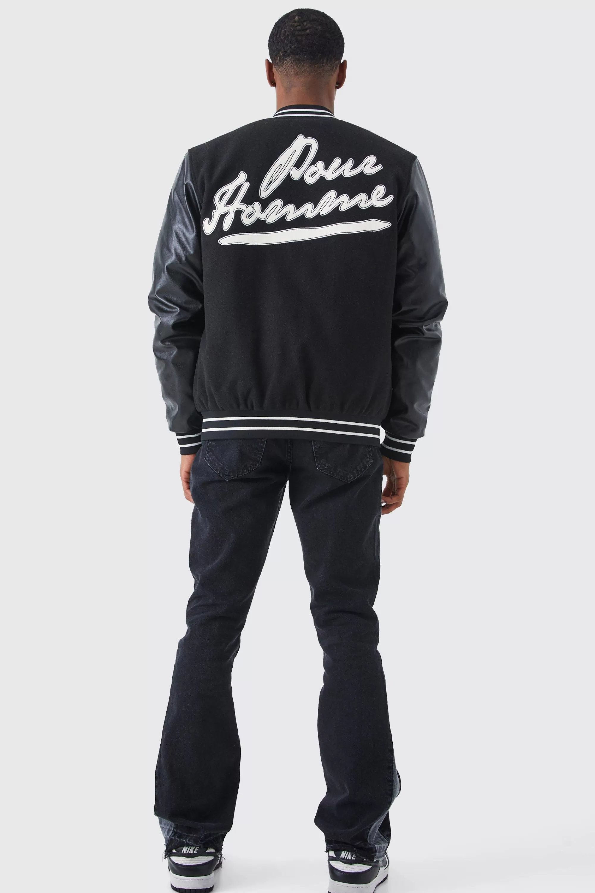 boohooMAN Slim Rigid Flare Contrast Gusset Rip Jeans | UK
