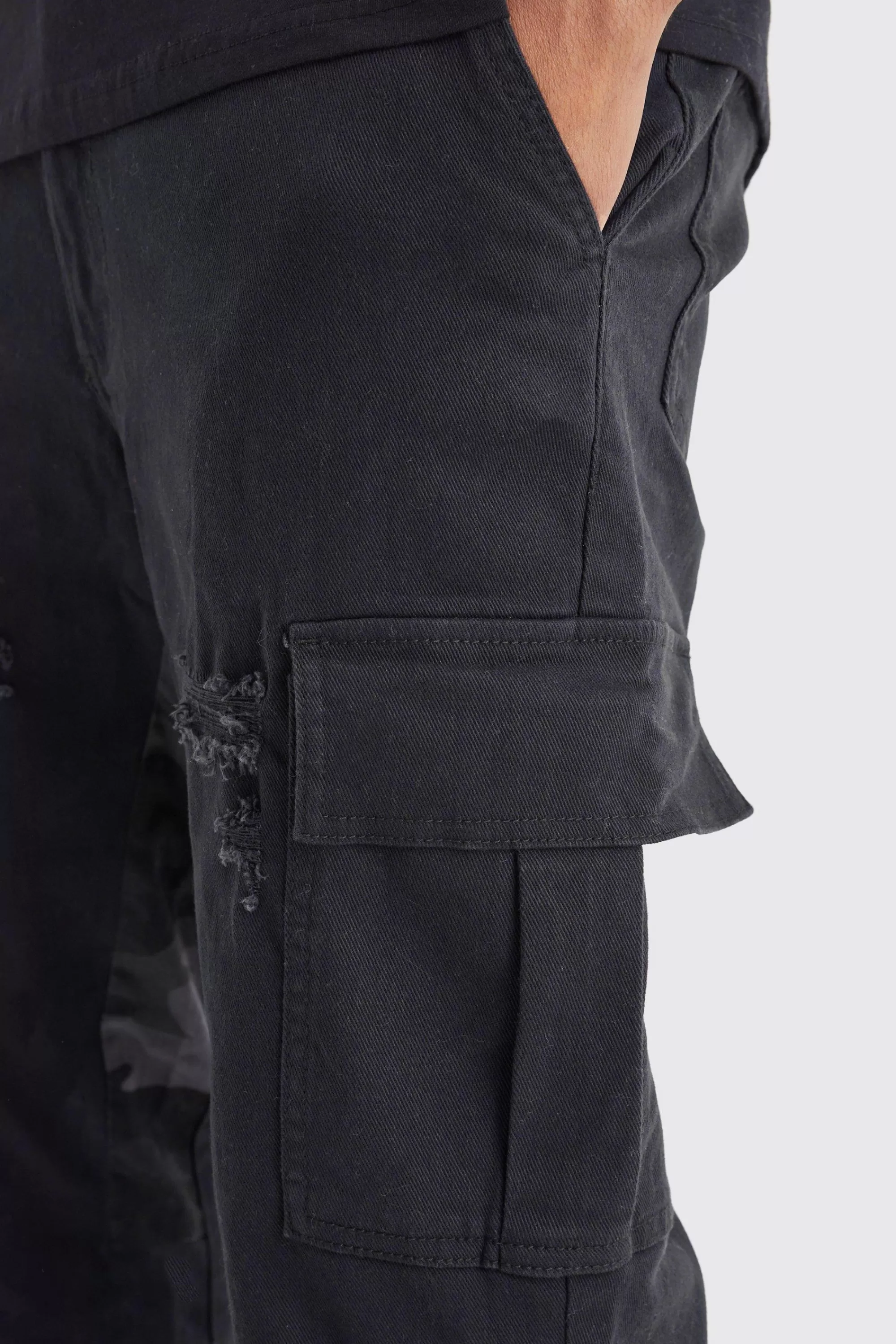 boohooMAN Slim Stacked Flare Camo Gusset Rip And Repair Trouser | UK