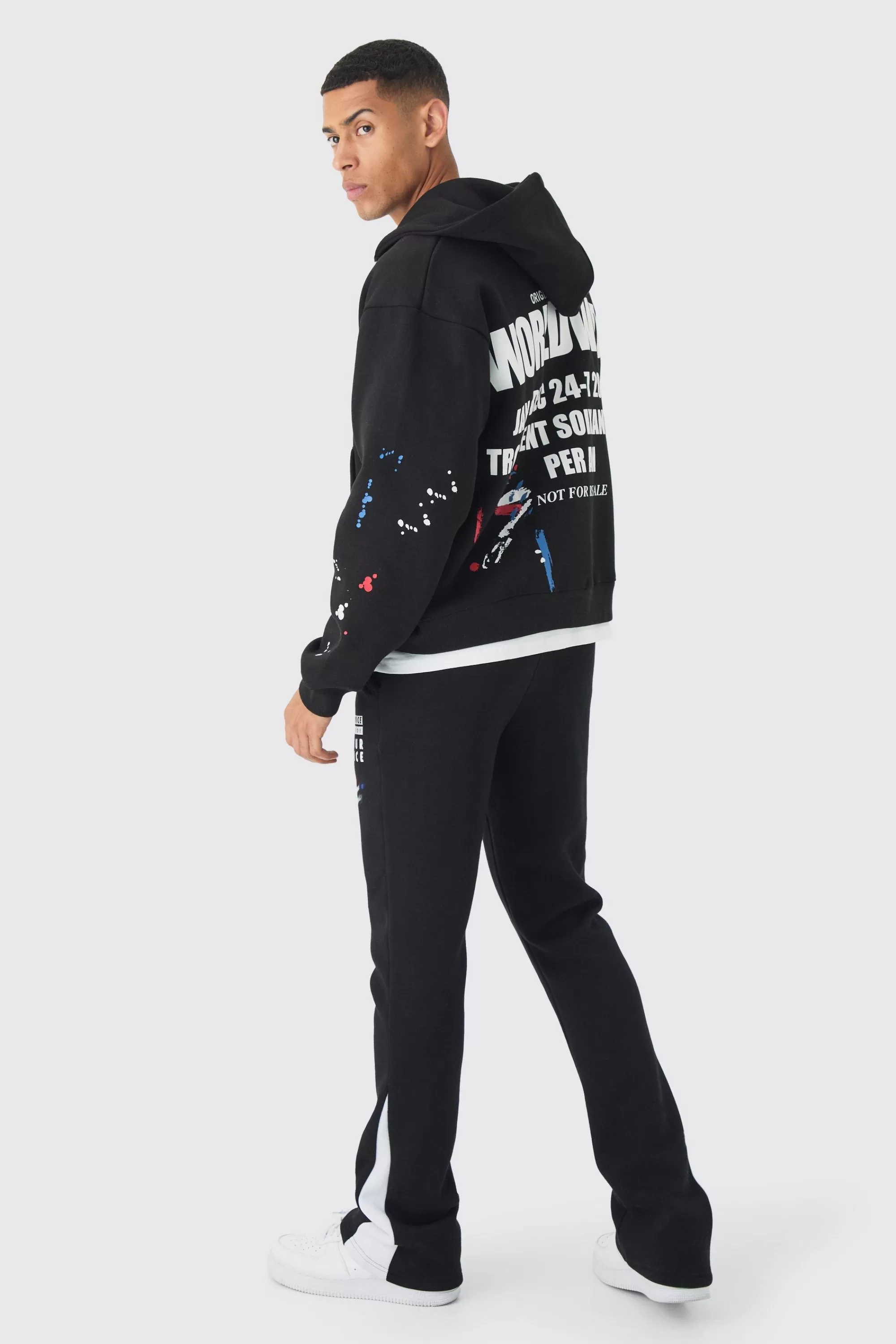 boohooMAN Slim Stacked Flare Paint Splatter Gusset Jogger | UK