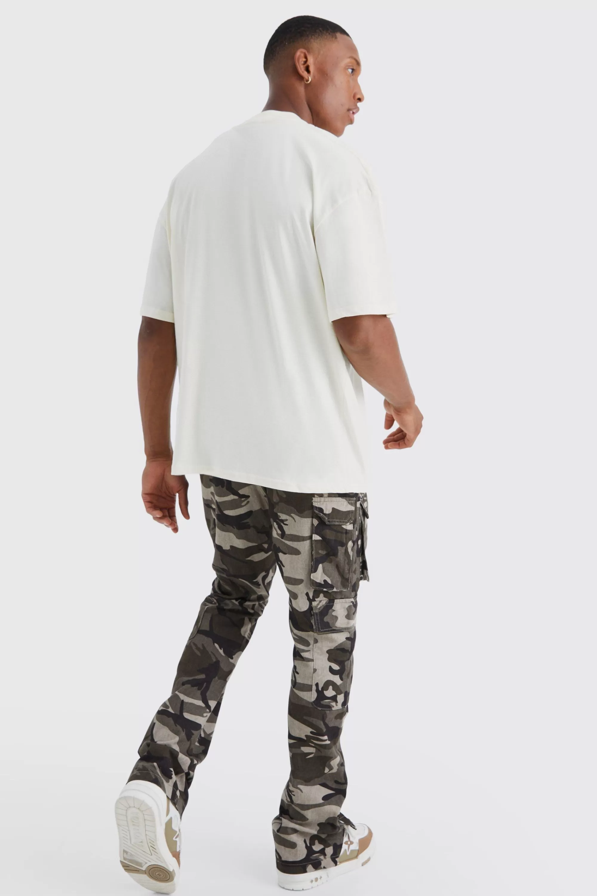 boohooMAN Slim Stacked Popper Hem Multi Cargo Camo Trouser | UK