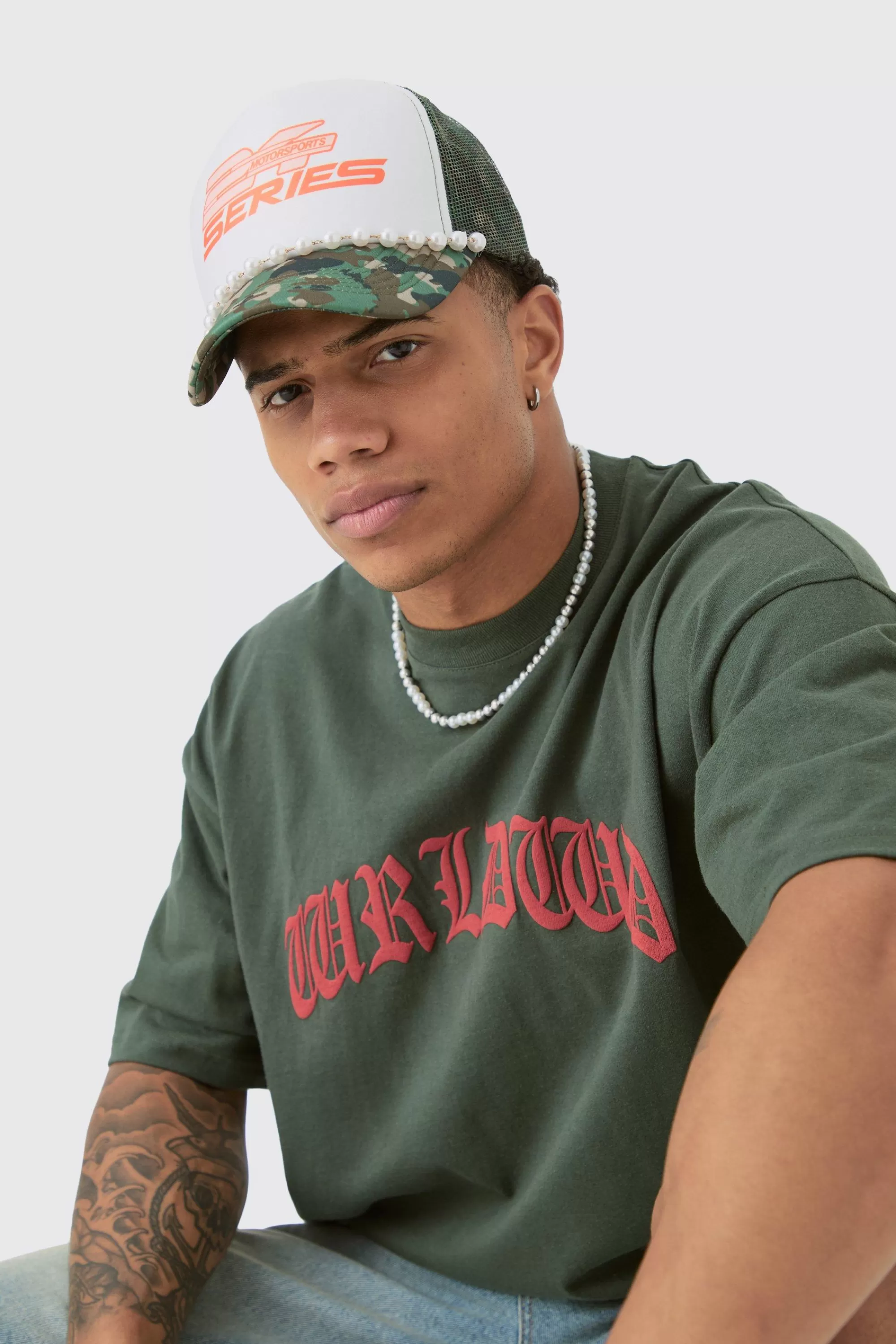 boohooMAN Slogan Foam Front Trucker Camo Cap With Pearl Detail In | UK