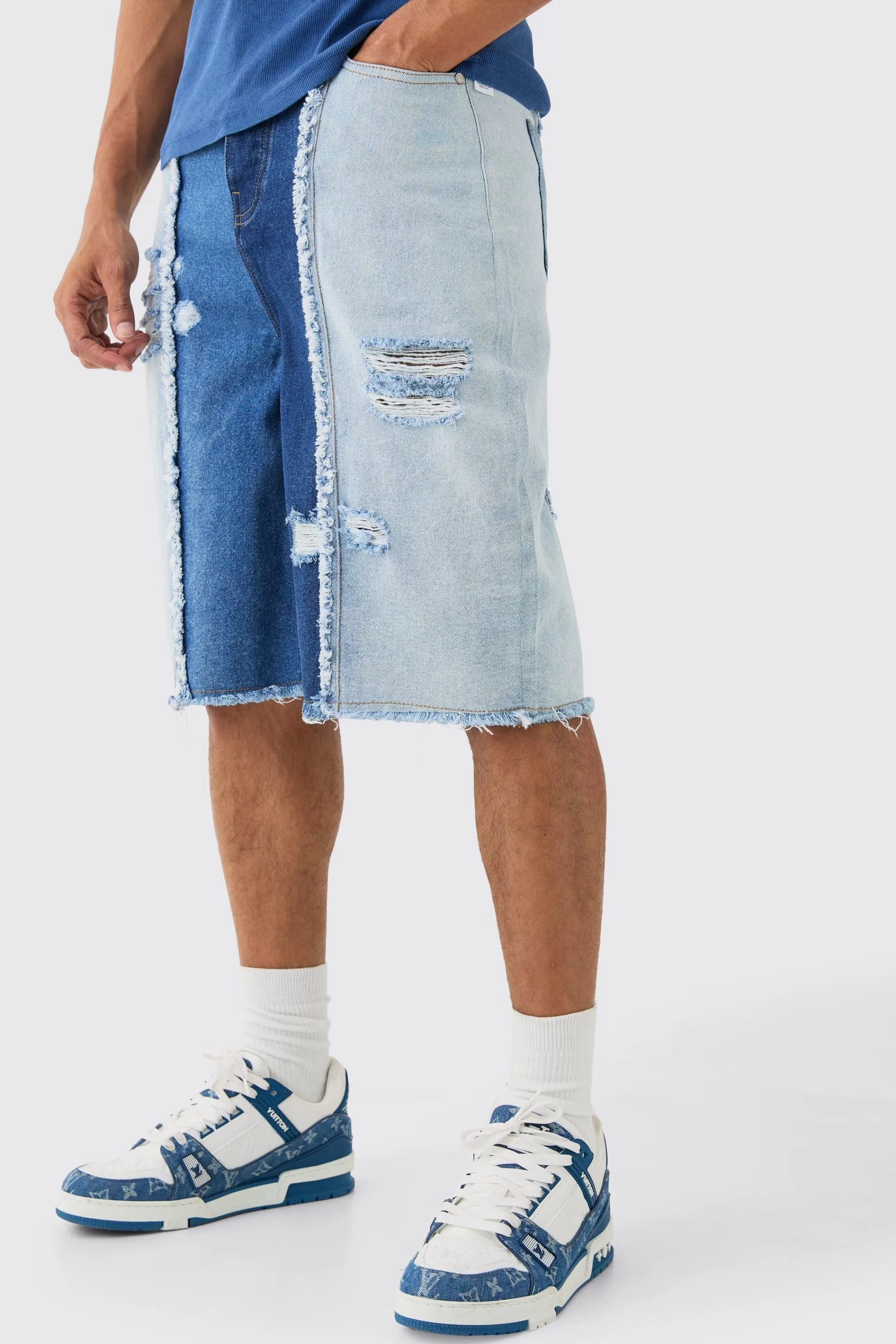 boohooMAN Spliced Distressed Denim Jorts In Blue | UK