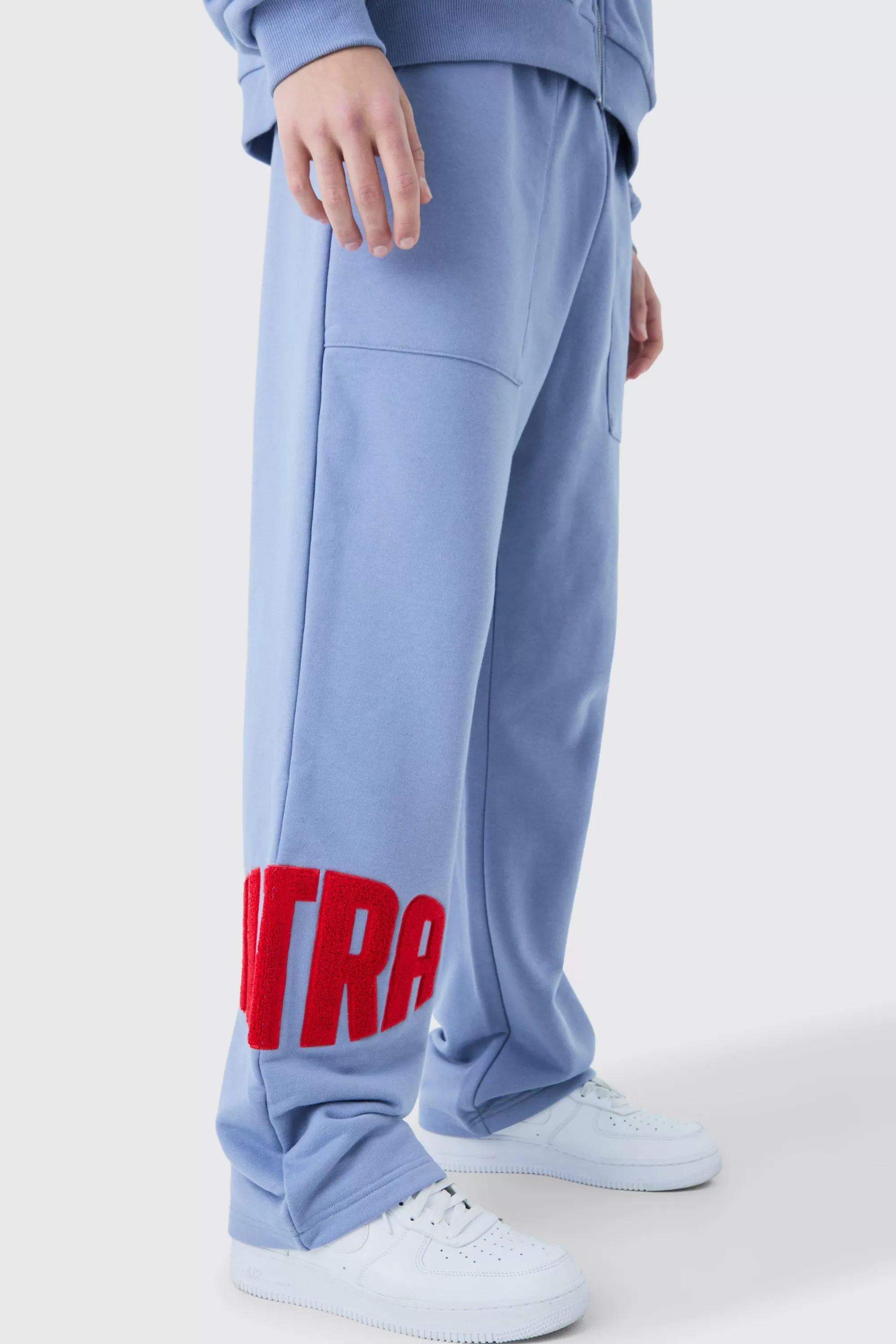 boohooMAN Straight Leg Borg Applique Joggers | UK