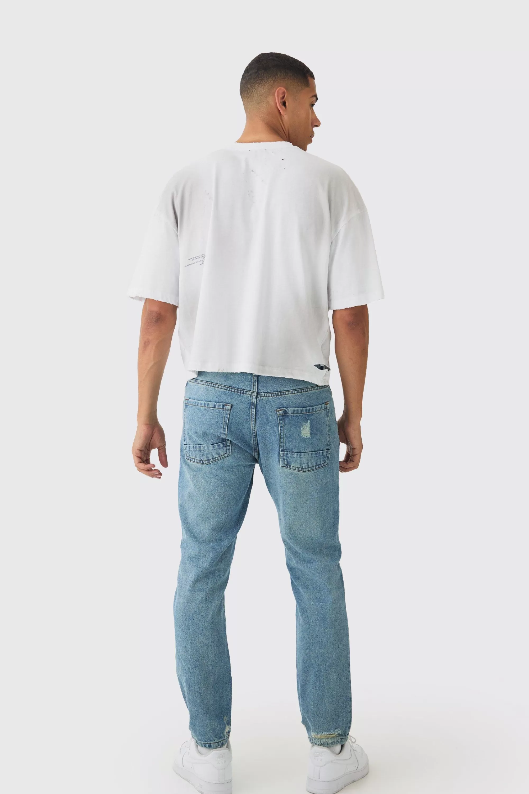 boohooMAN Straight Leg Distressed Ripped Knee Jeans | UK