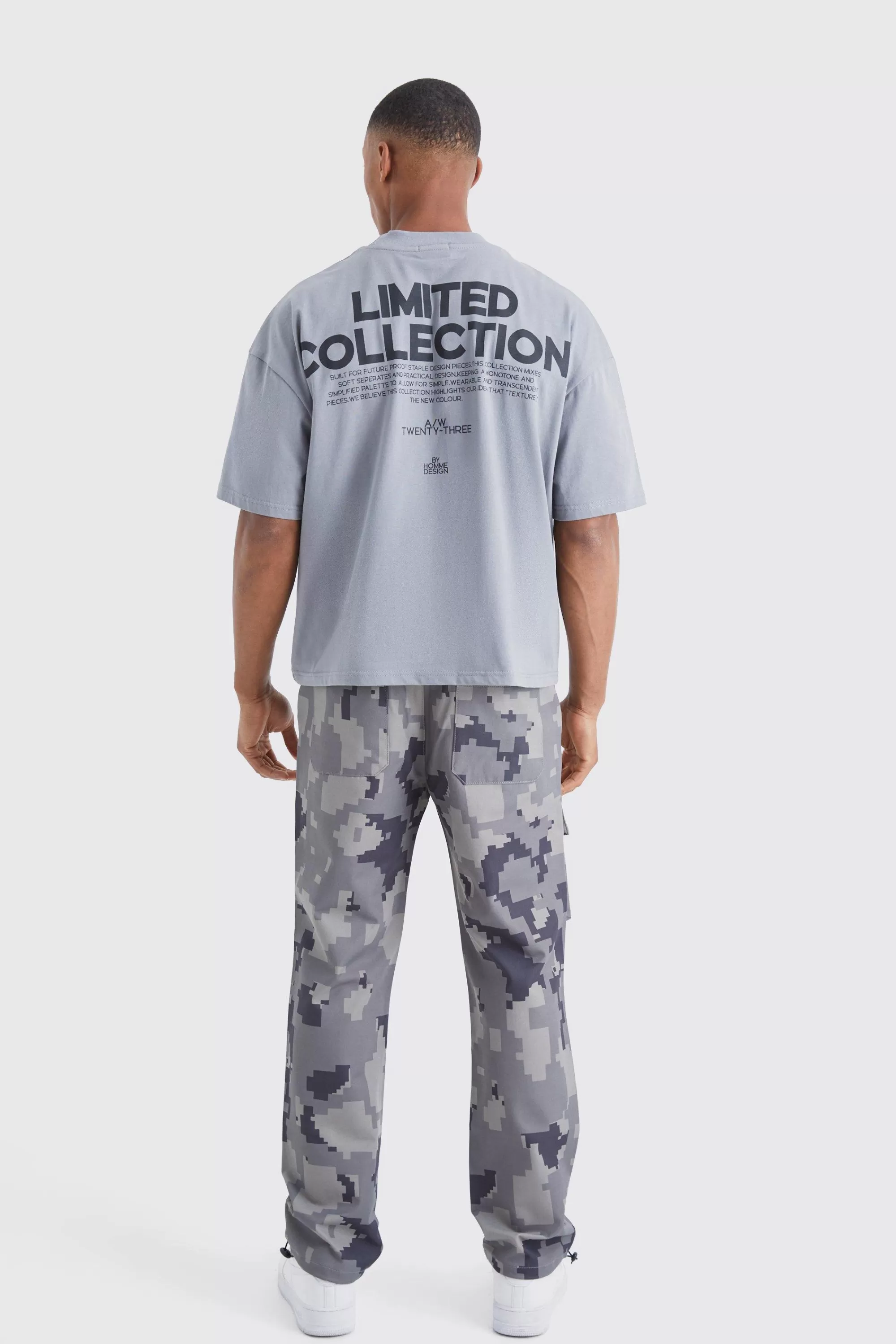boohooMAN Straight Leg Pixel Camo Cargo Pocket Trouser | UK